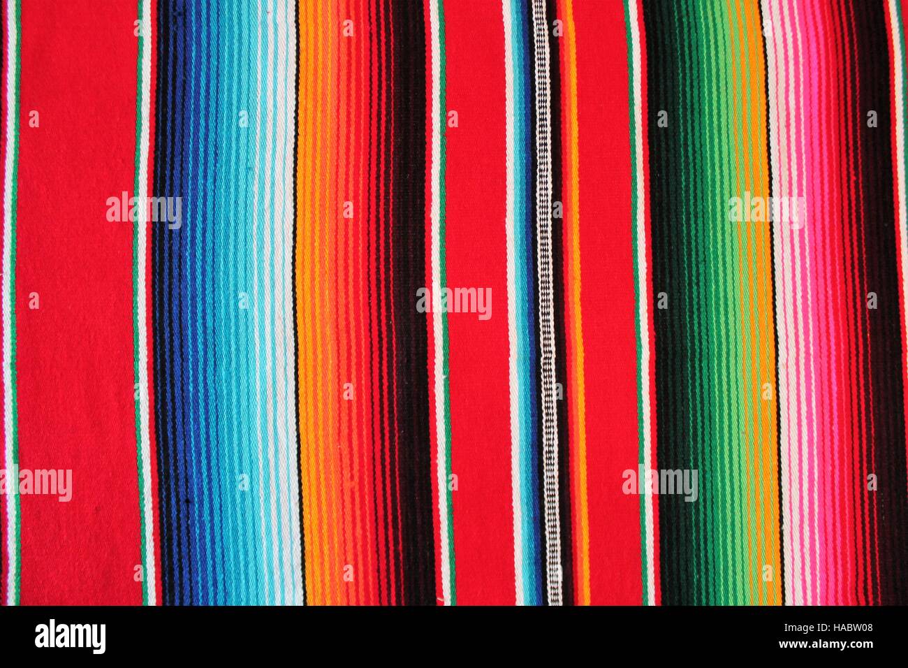 Mexico poncho serape pattern traditional culture rug poncho fiesta  background with stripes pattern copy space Stock Photo - Alamy