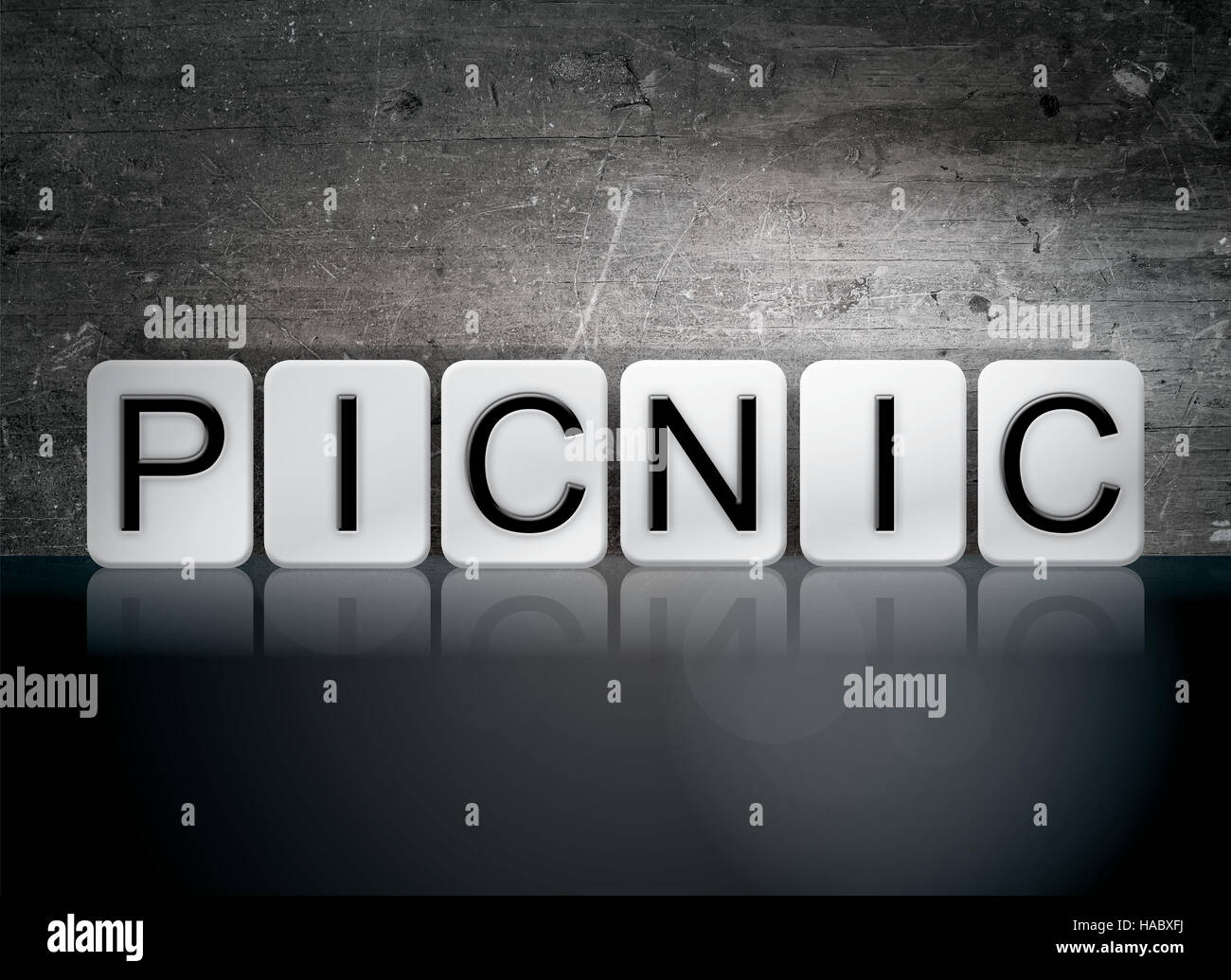 The word "Picnic" written in white tiles against a dark vintage grunge