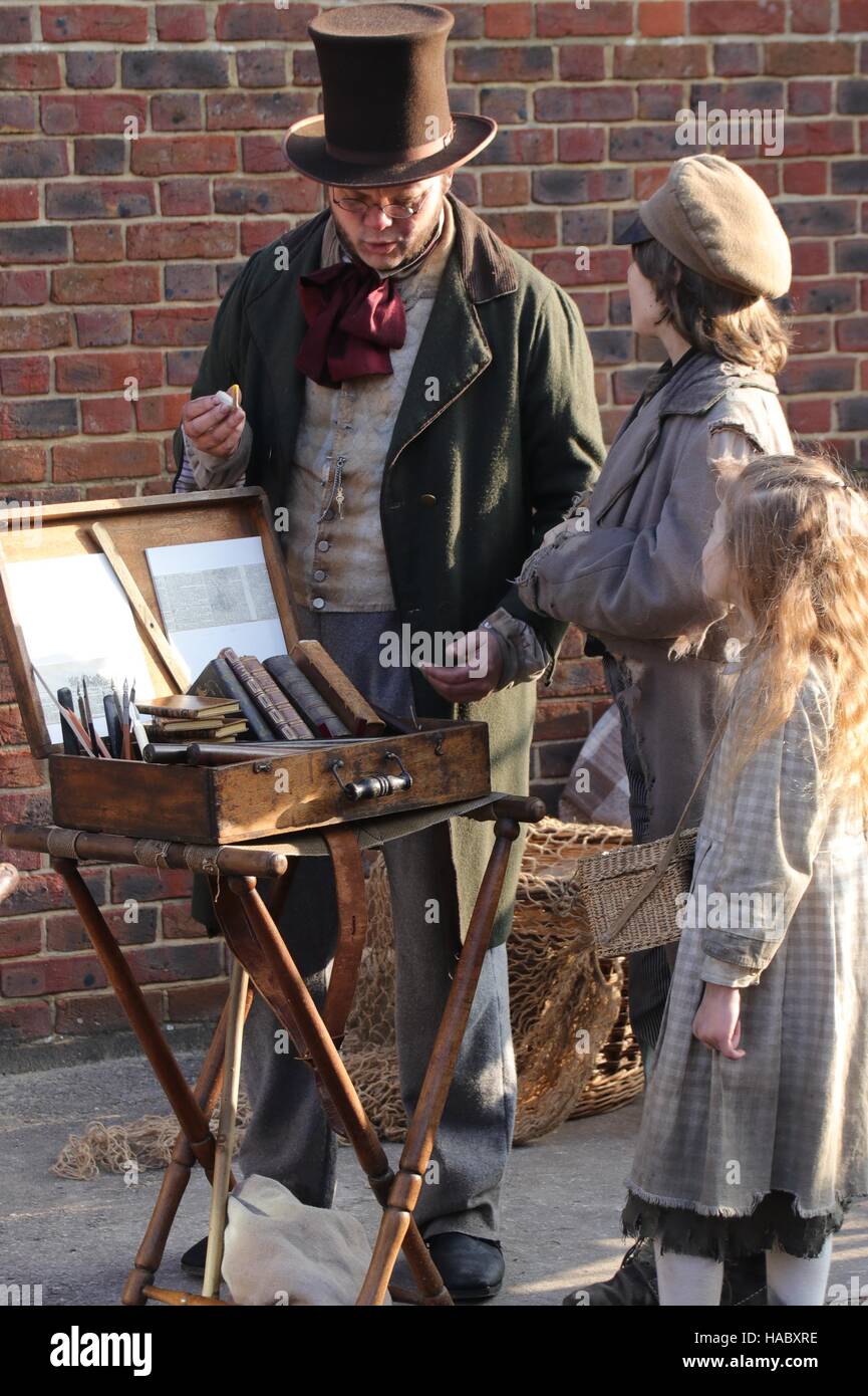 :Unknown actors playing the parts of  victorians at the yearly Christmas victorian festival in portsmouth dockyard,england,26th november 2016 Stock Photo