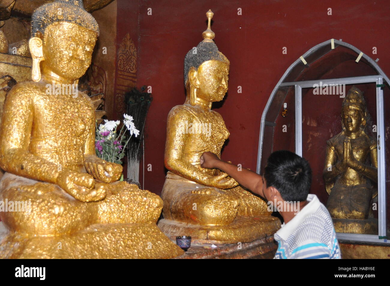 Praying to Buddha in Ananda Paya, pagoda, Bagan, Pagan, Myanmar Stock Photo