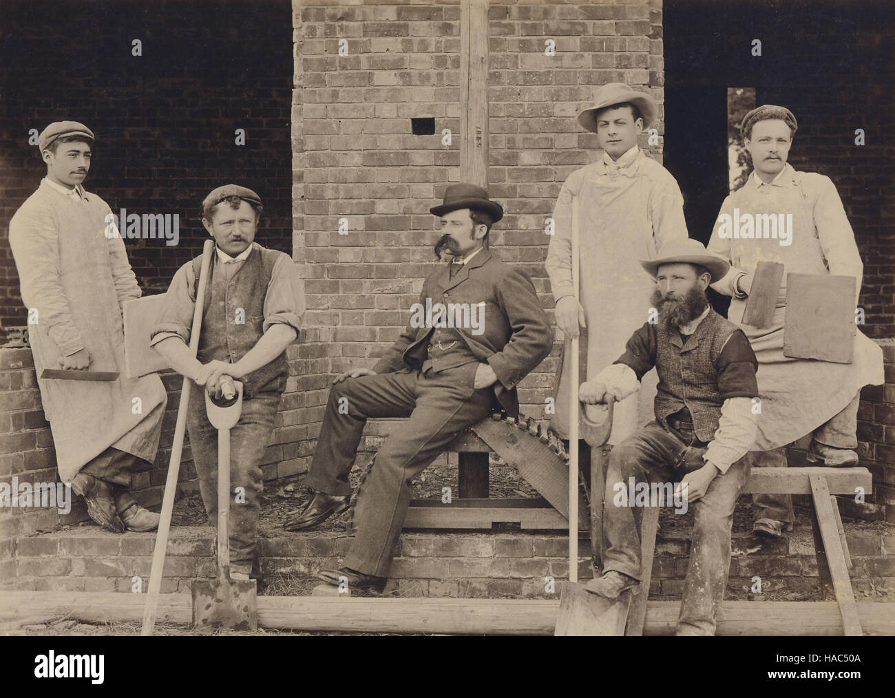 Historic archive image of gent with construction workers at Wokingham, Berkshire. c1900 Stock Photo