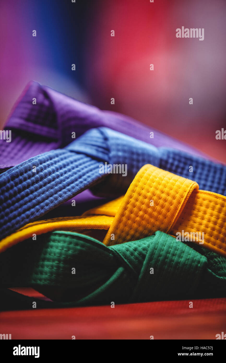 Blue, yellow and green karate belt Stock Photo Alamy