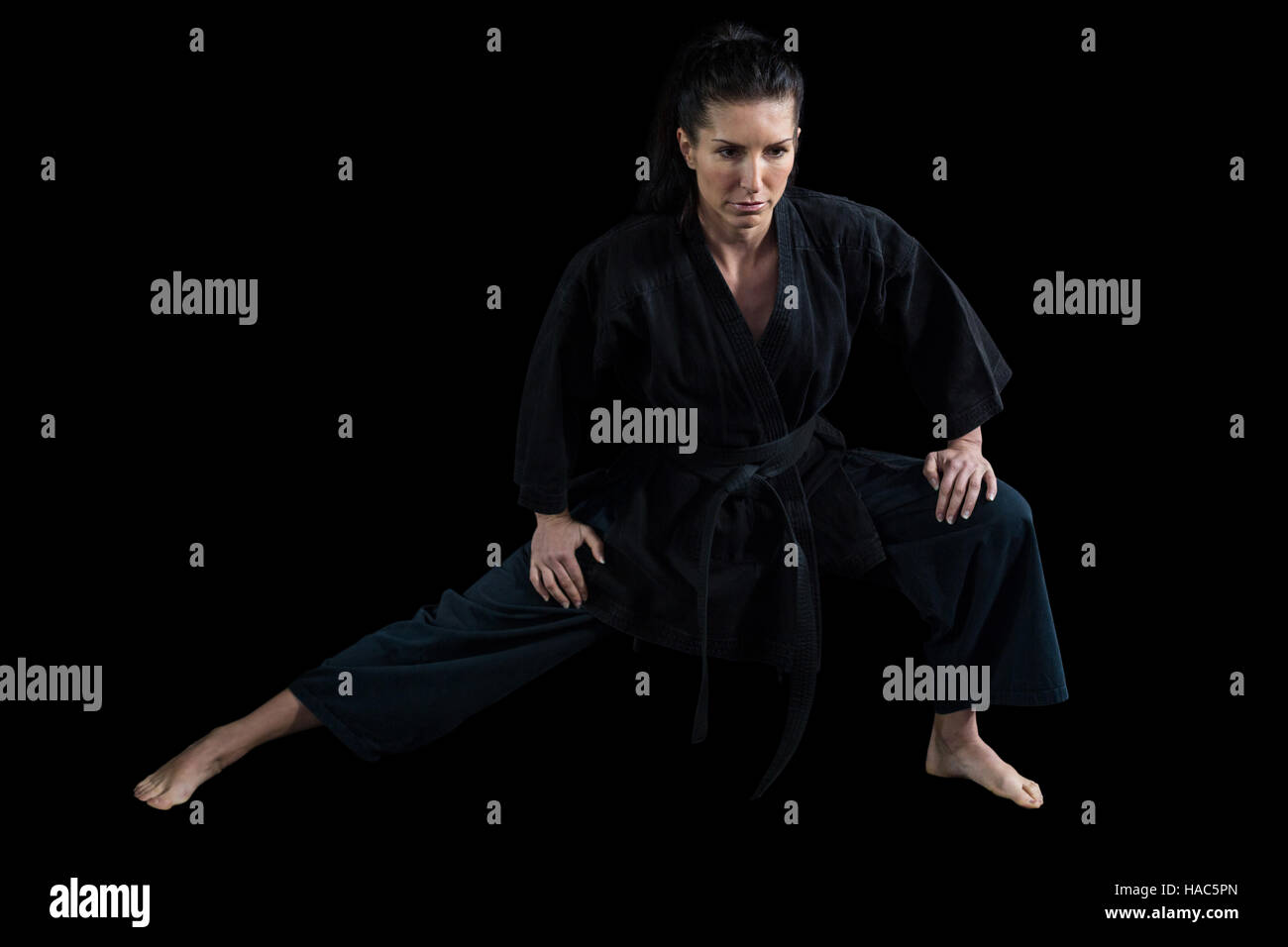 Female karate player performing karate stance Stock Photo Alamy