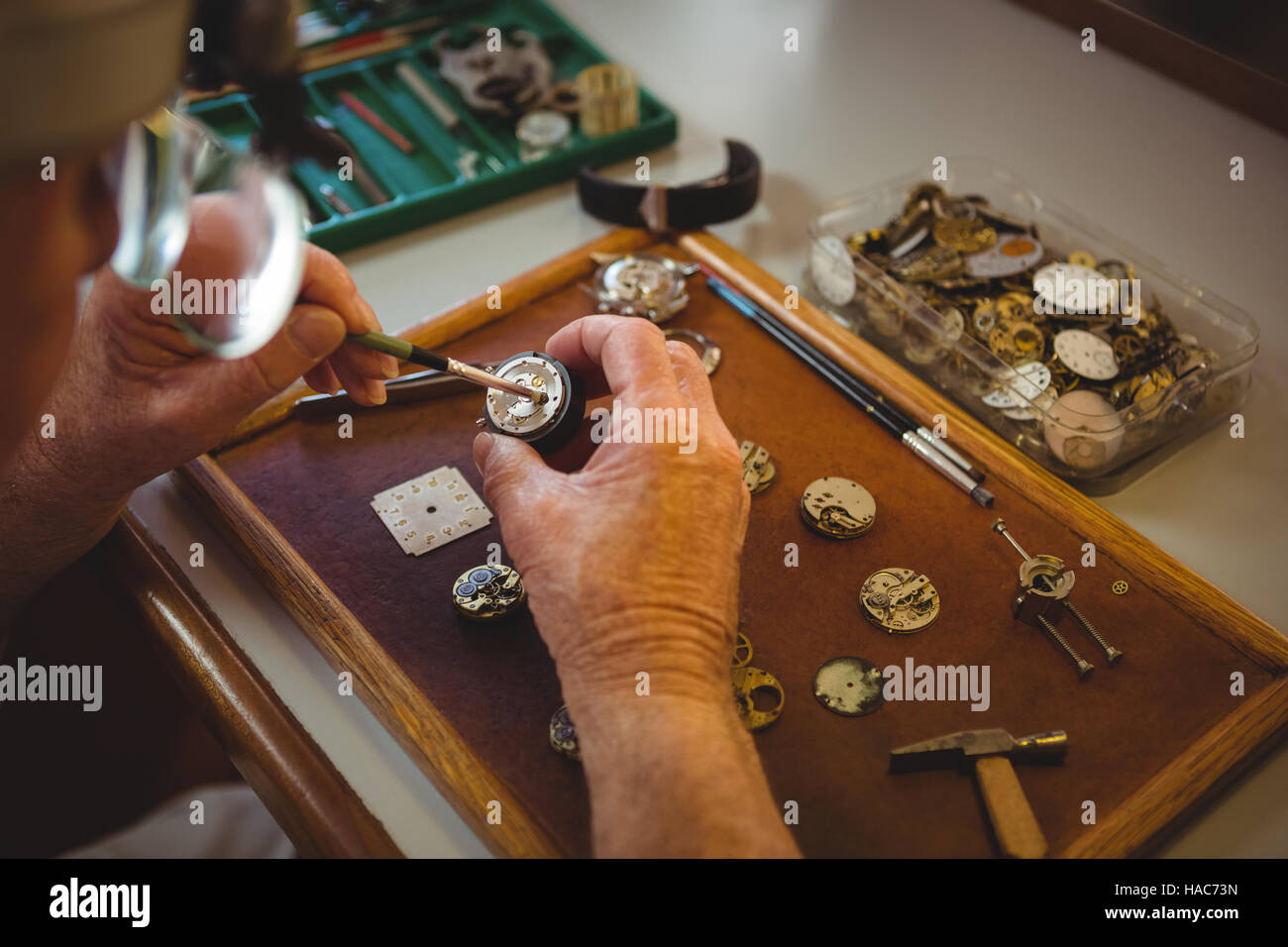 Horologist repairing a watch Stock Photo Alamy