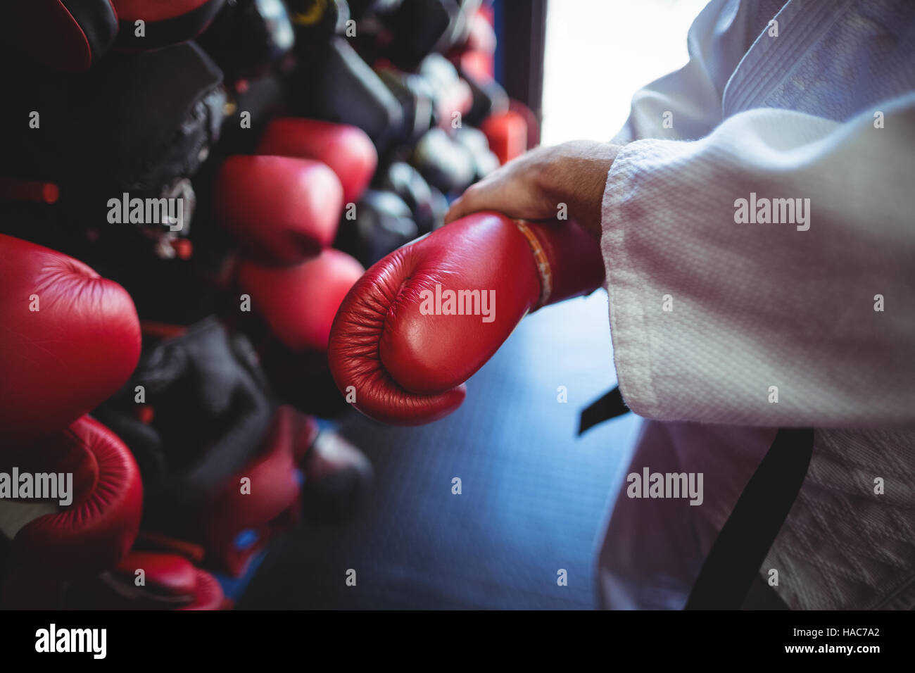 Kick boxer wearing gloves Stock Photo Alamy