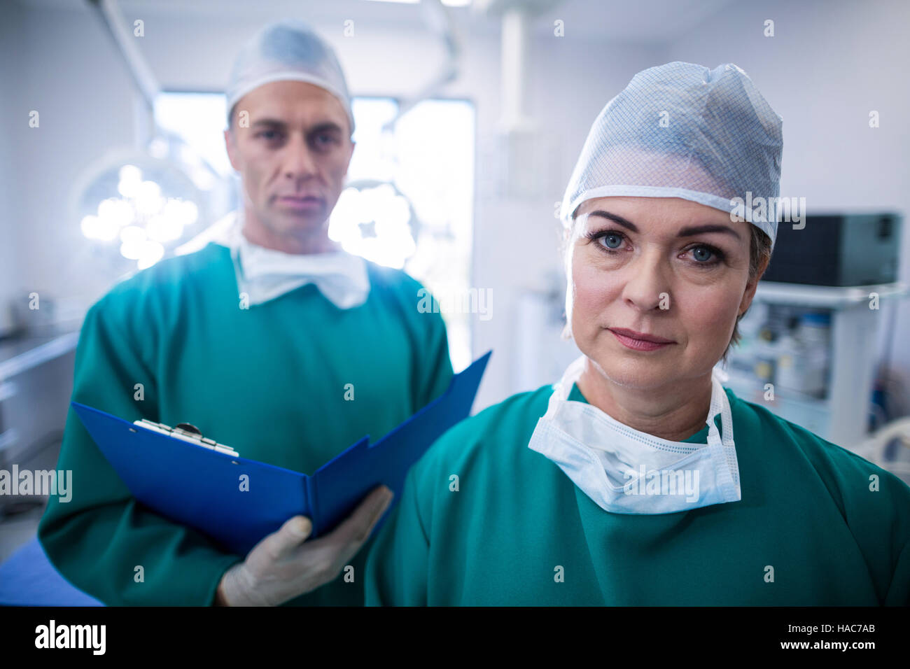 Portrait of surgeons in operation room Stock Photo - Alamy