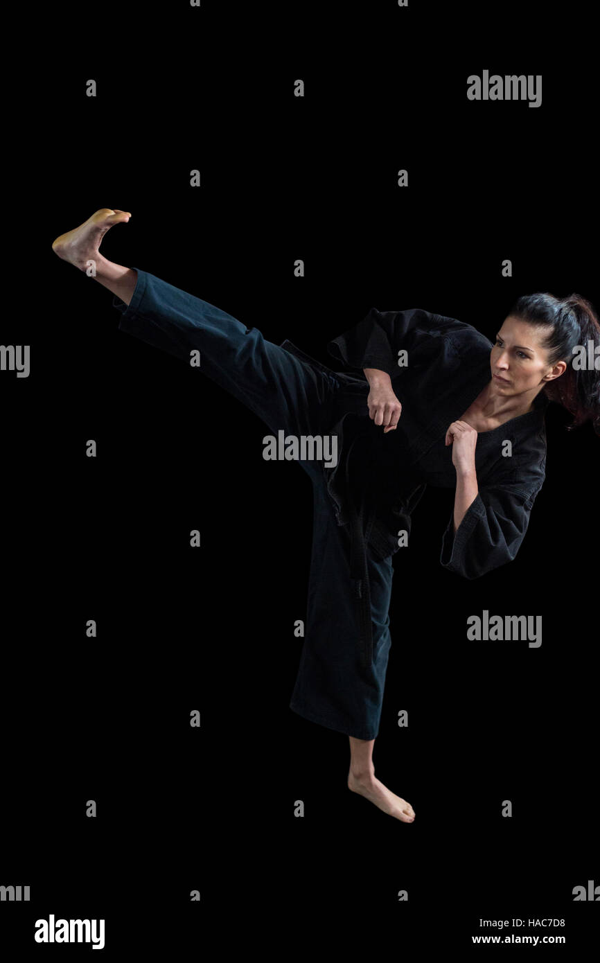 Female karate player performing karate stance Stock Photo Alamy