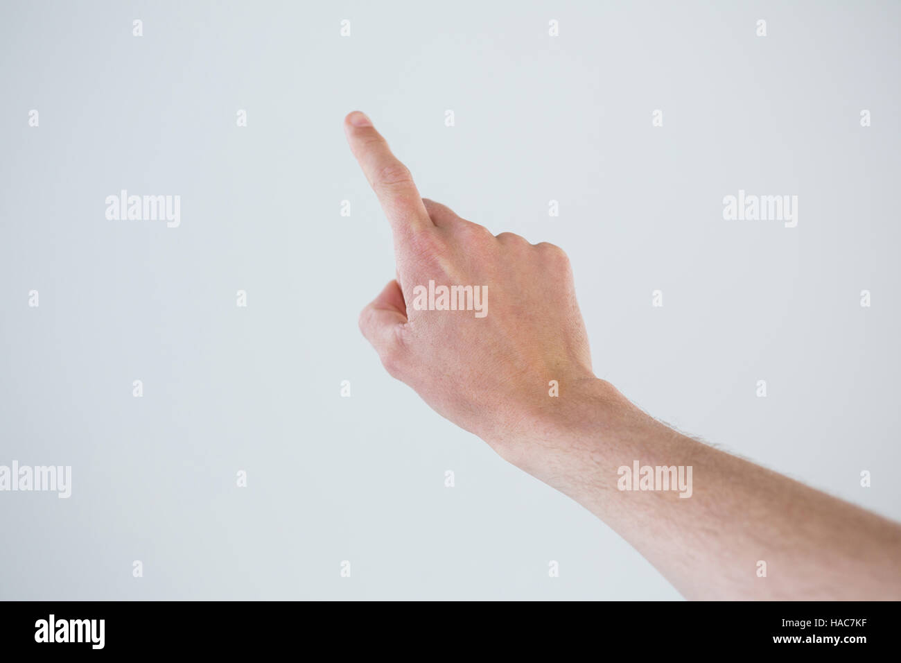 Hand of a man pointing upwards Stock Photo - Alamy