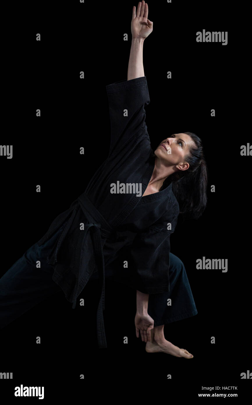 Female karate player performing karate stance Stock Photo Alamy
