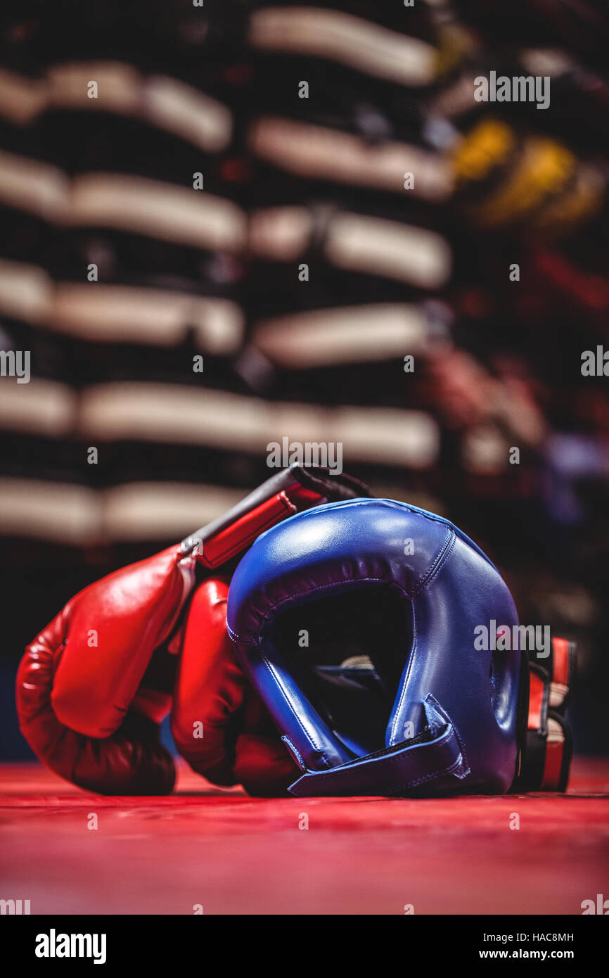 Boxing gloves and headgear in boxing ring Stock Photo Alamy