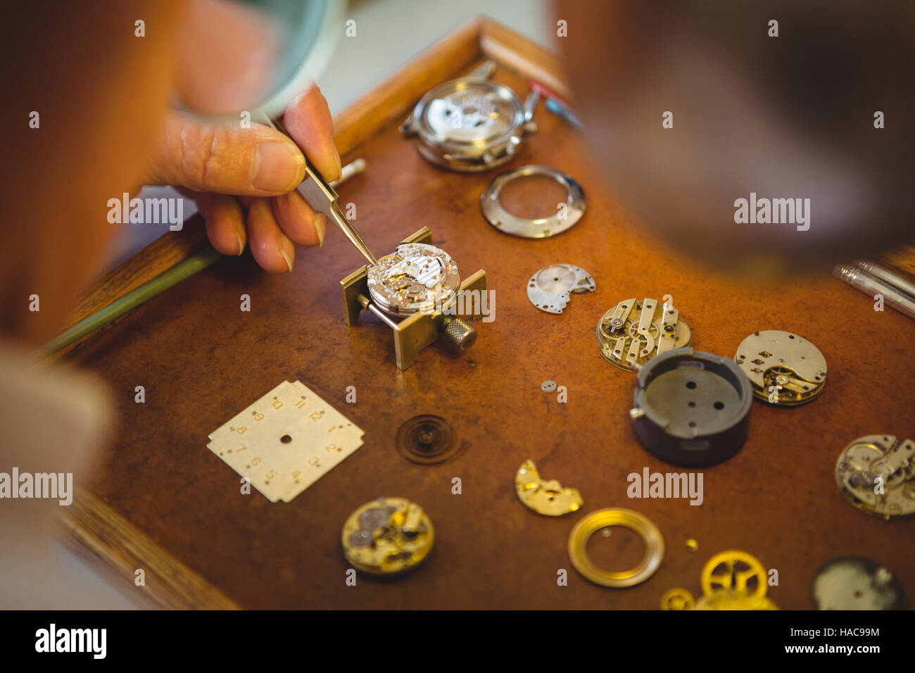 Horologist repairing a watch Stock Photo Alamy