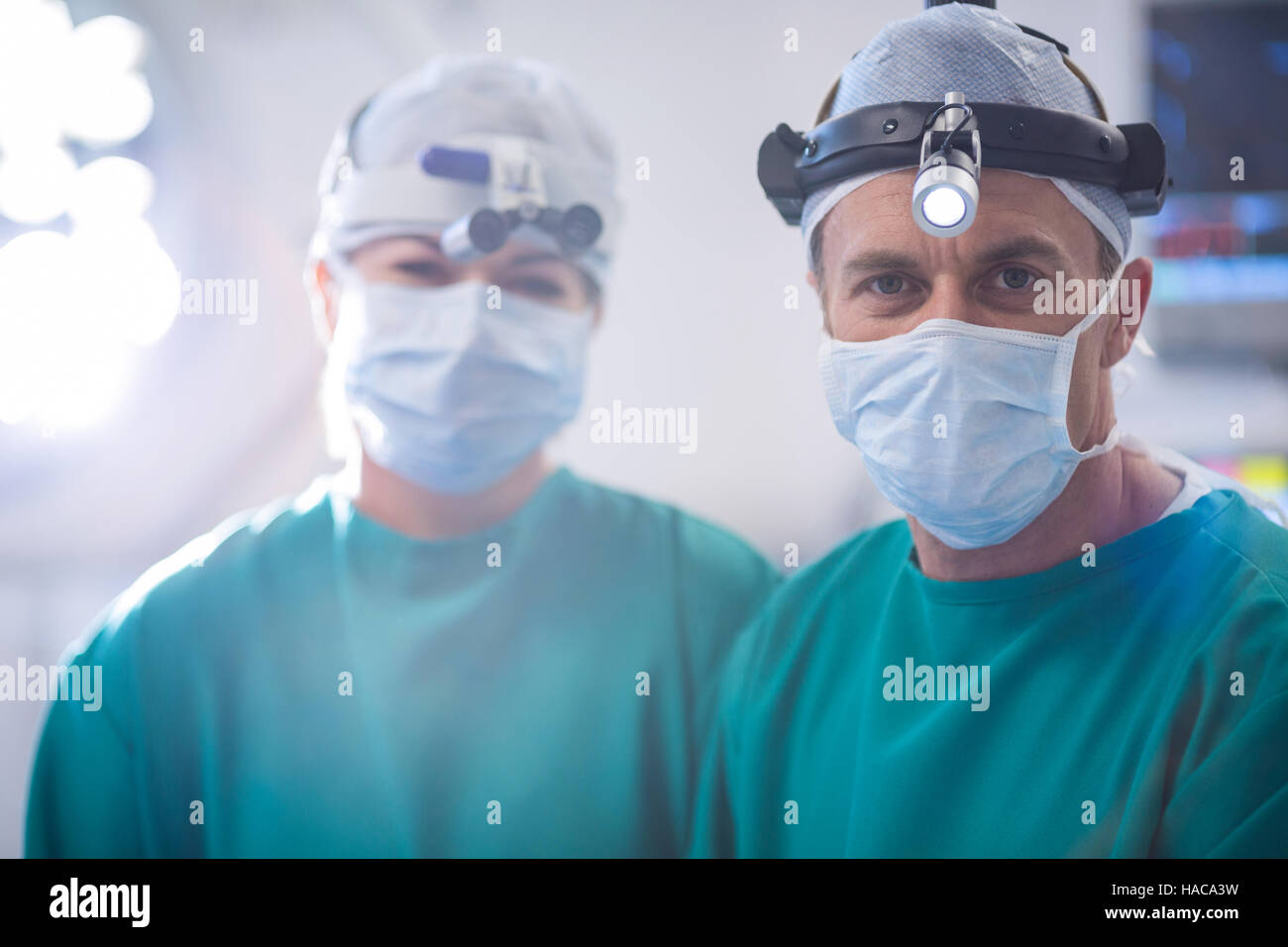 Portrait of surgeons in operation room Stock Photo - Alamy