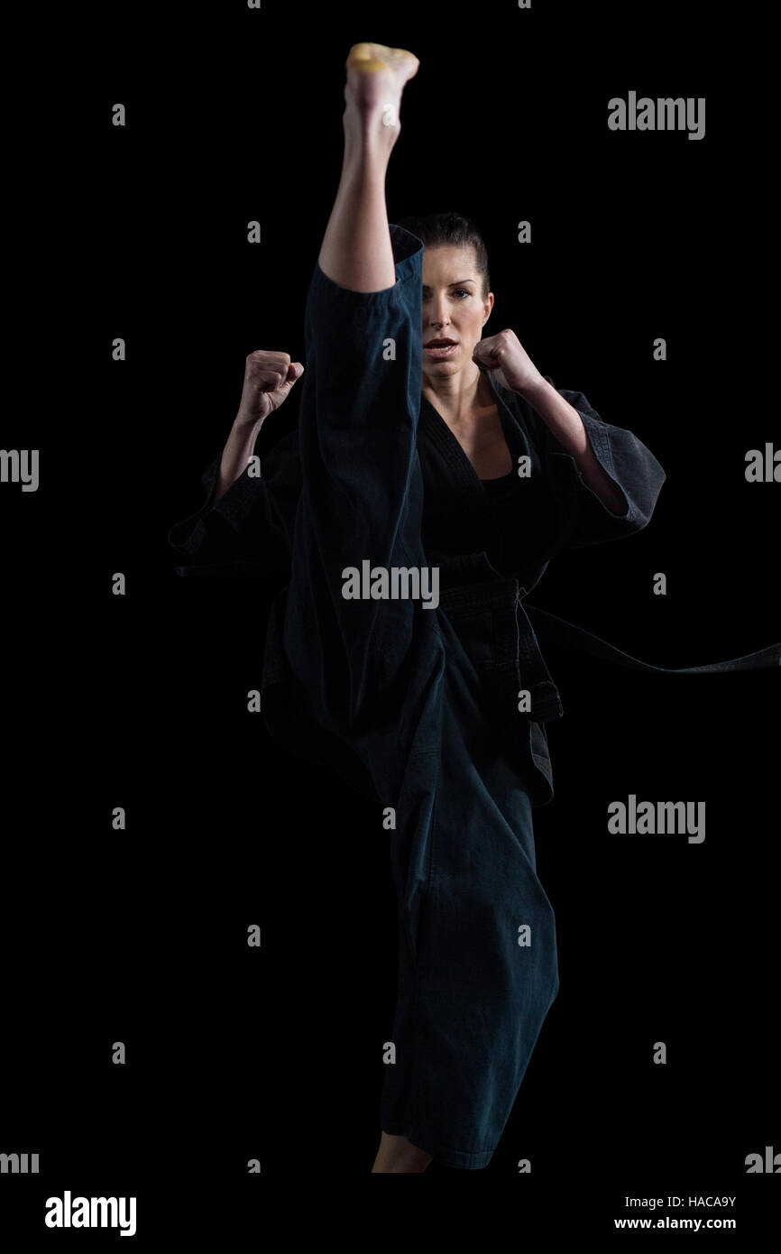 Female karate player performing karate stance Stock Photo Alamy