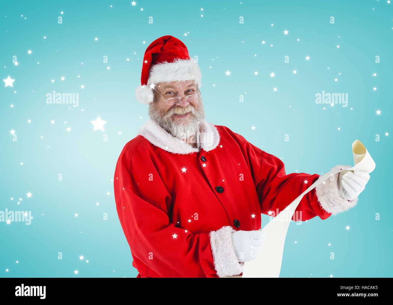 Happy santa holding checklist Stock Photo