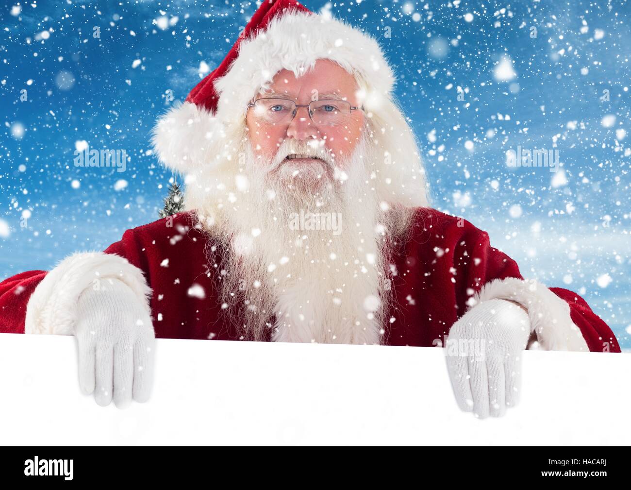 Santa clause holding white placard Stock Photo