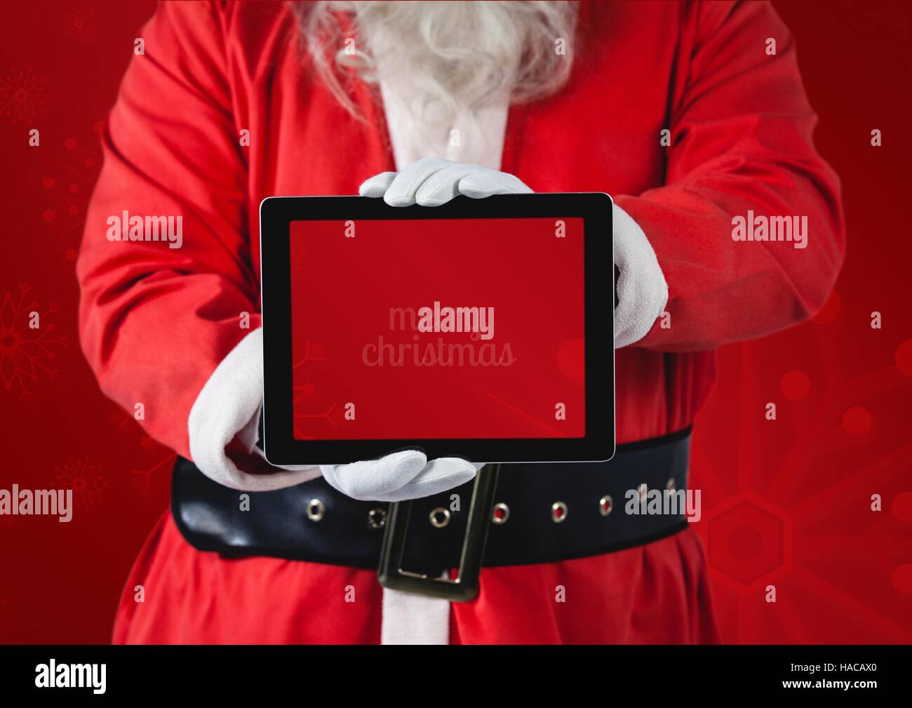Hands of santa claus holding a digital tablet Stock Photo - Alamy
