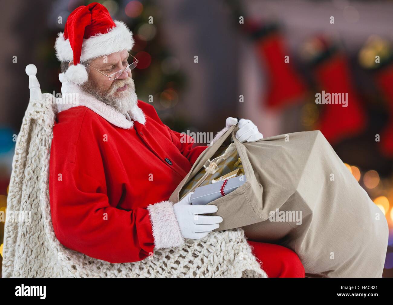 Santa claus sitting on a chair hi-res stock photography and images - Alamy