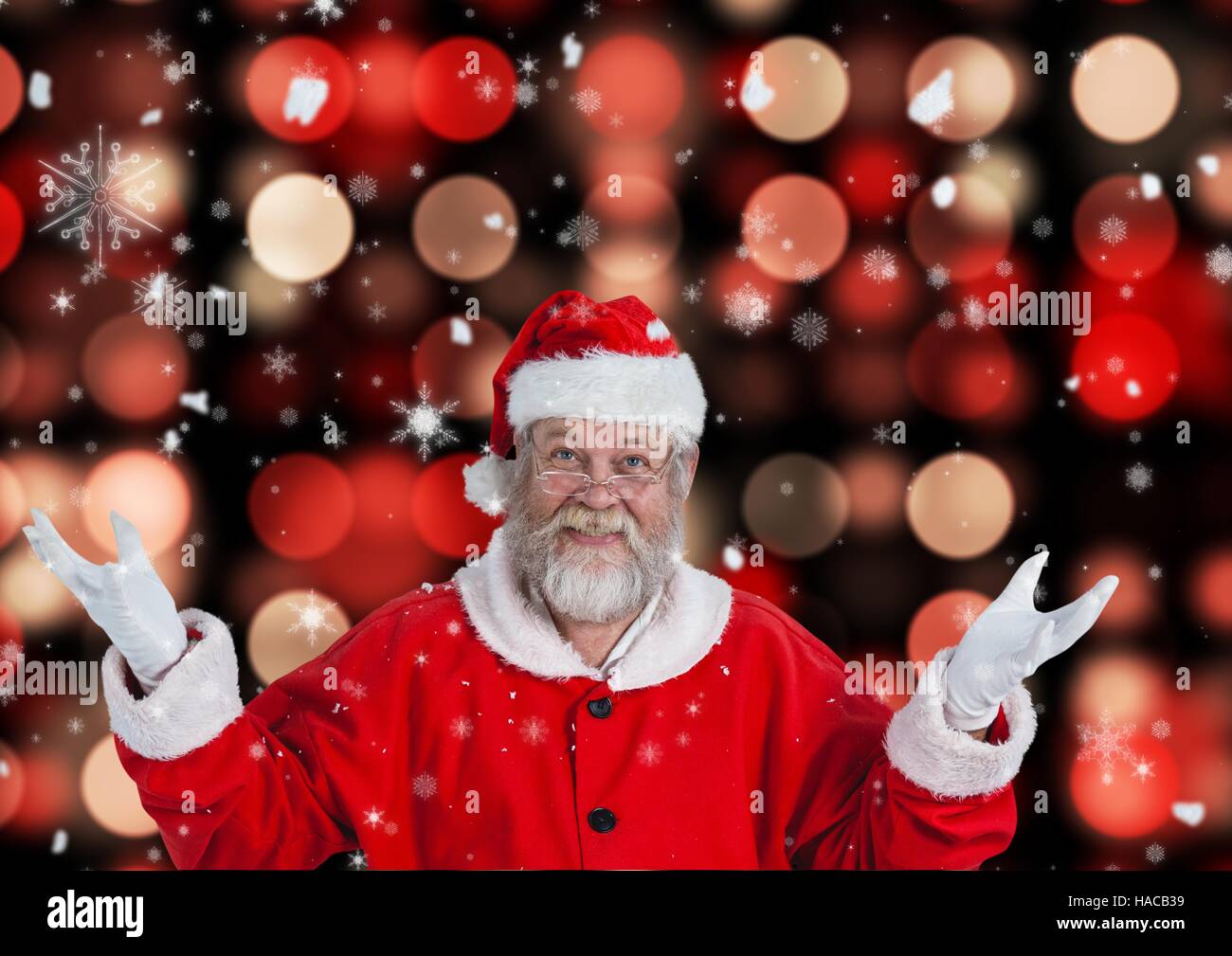 Happy santa welcoming with open hands Stock Photo