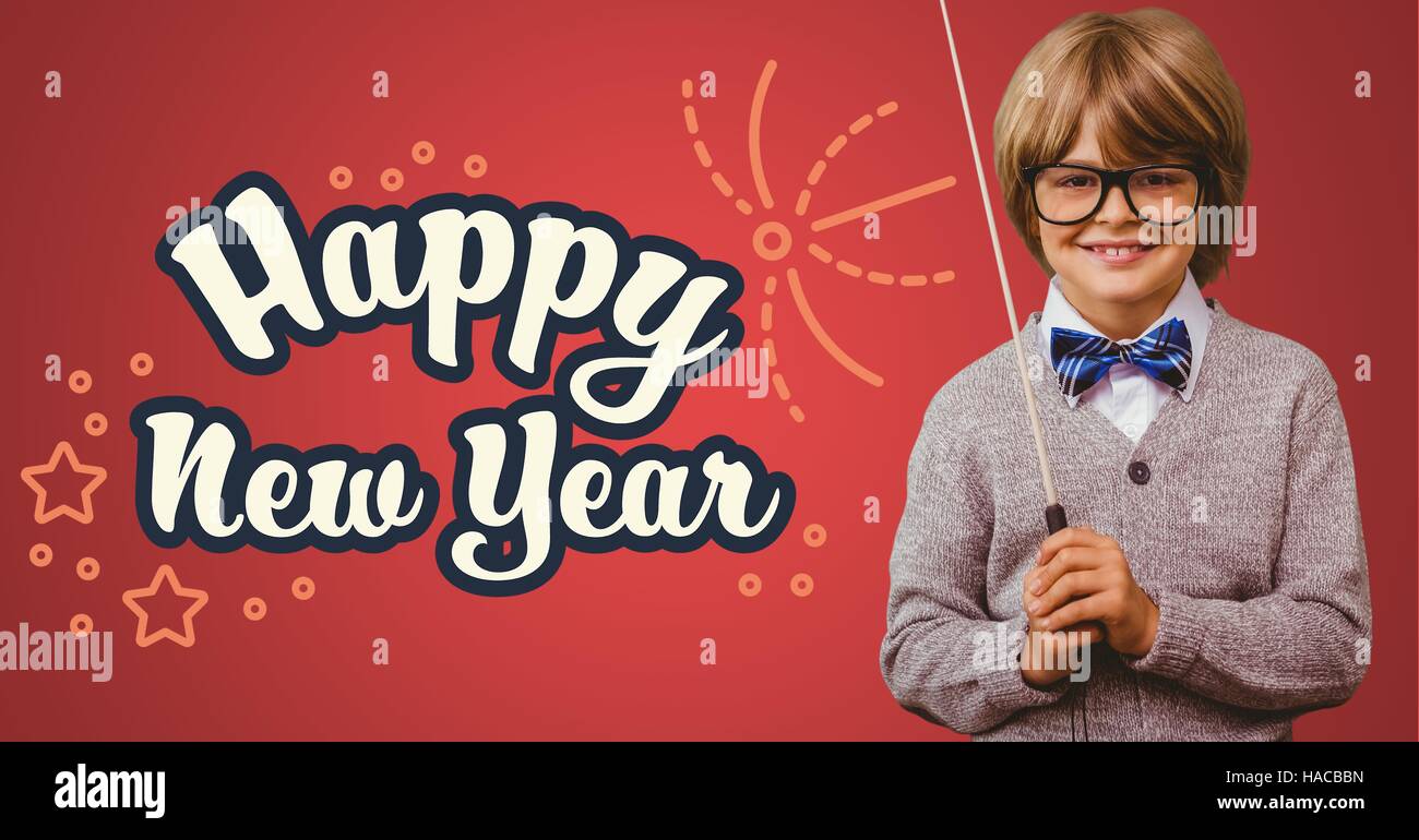 Smiling boy with stick standing against happy new year greeting quotes ...