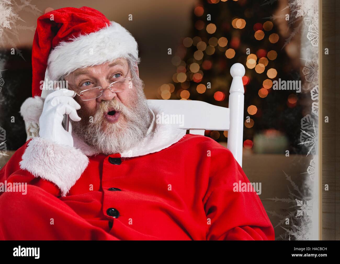 Santa claus talking on mobile phone Stock Photo - Alamy
