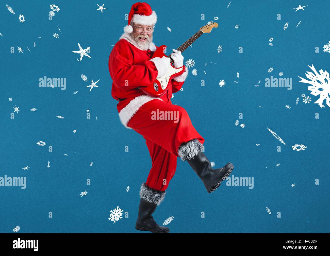 Santa playing guitar hires stock photography and images Alamy