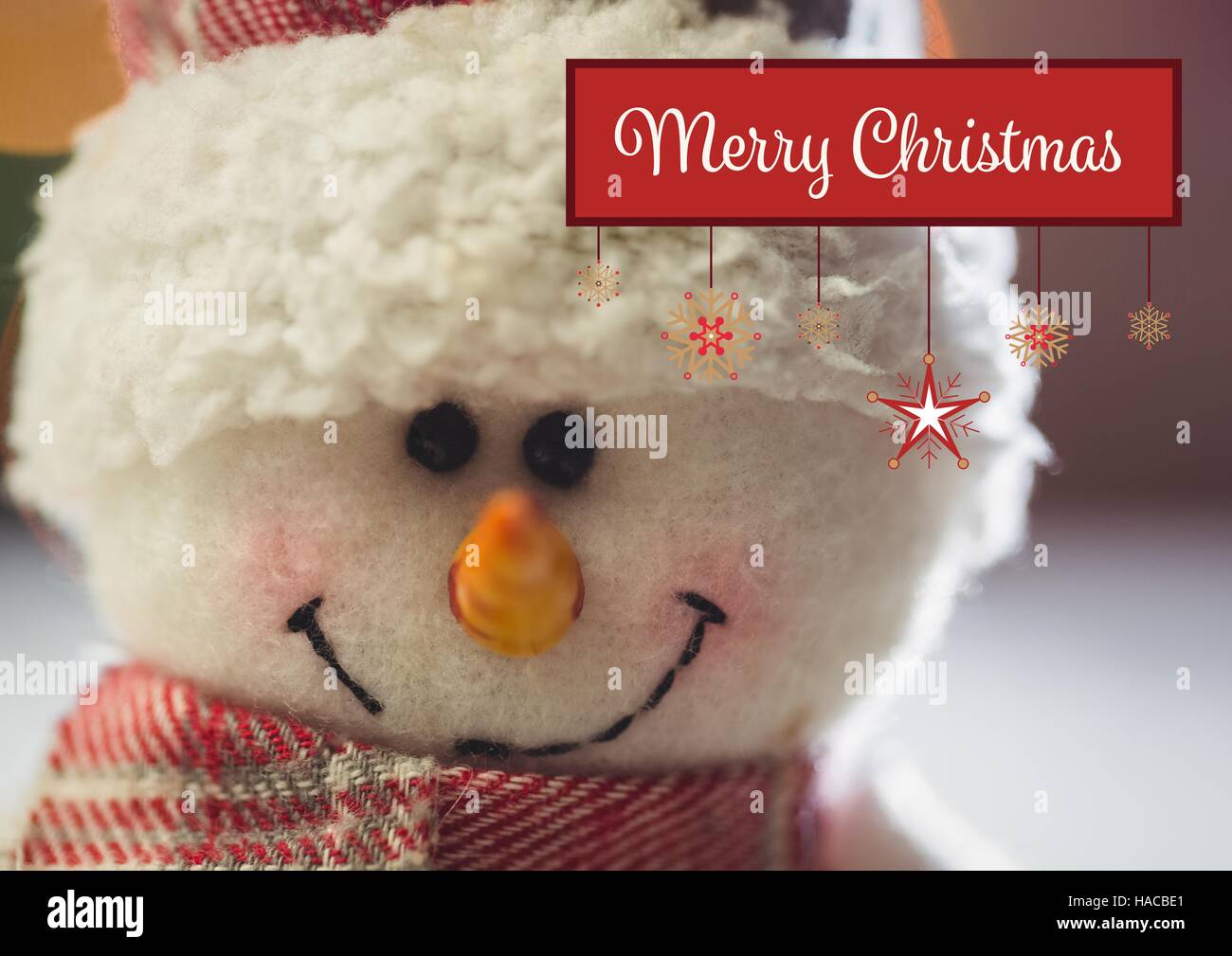 Merry christmas message against snowman Stock Photo