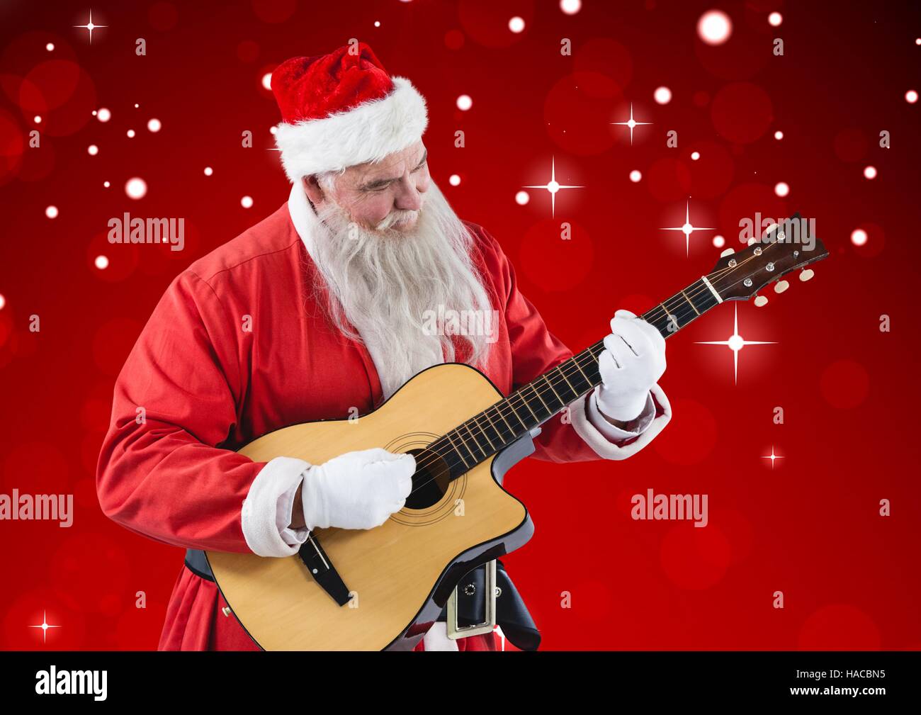 Santa claus playing guitar Stock Photo