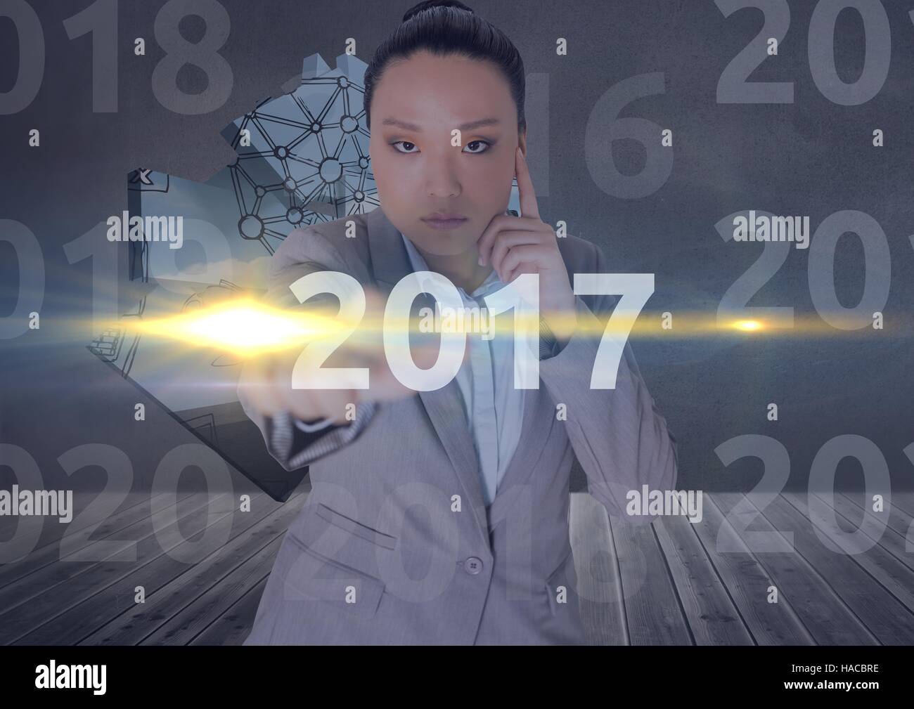 Business woman in 3D digitally generated background touching 2017 Stock Photo