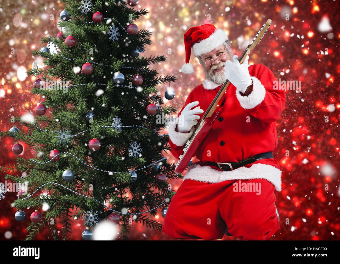 Santa playing electric guitar Stock Photo