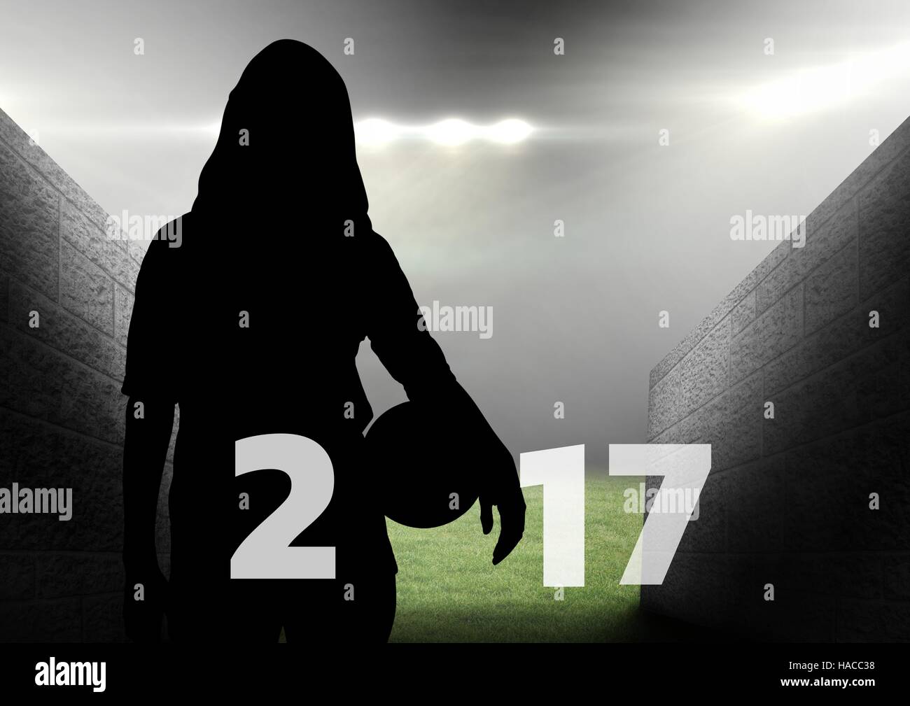Silhouette of woman holding ball forming 2017 new year sign 3D Stock Photo