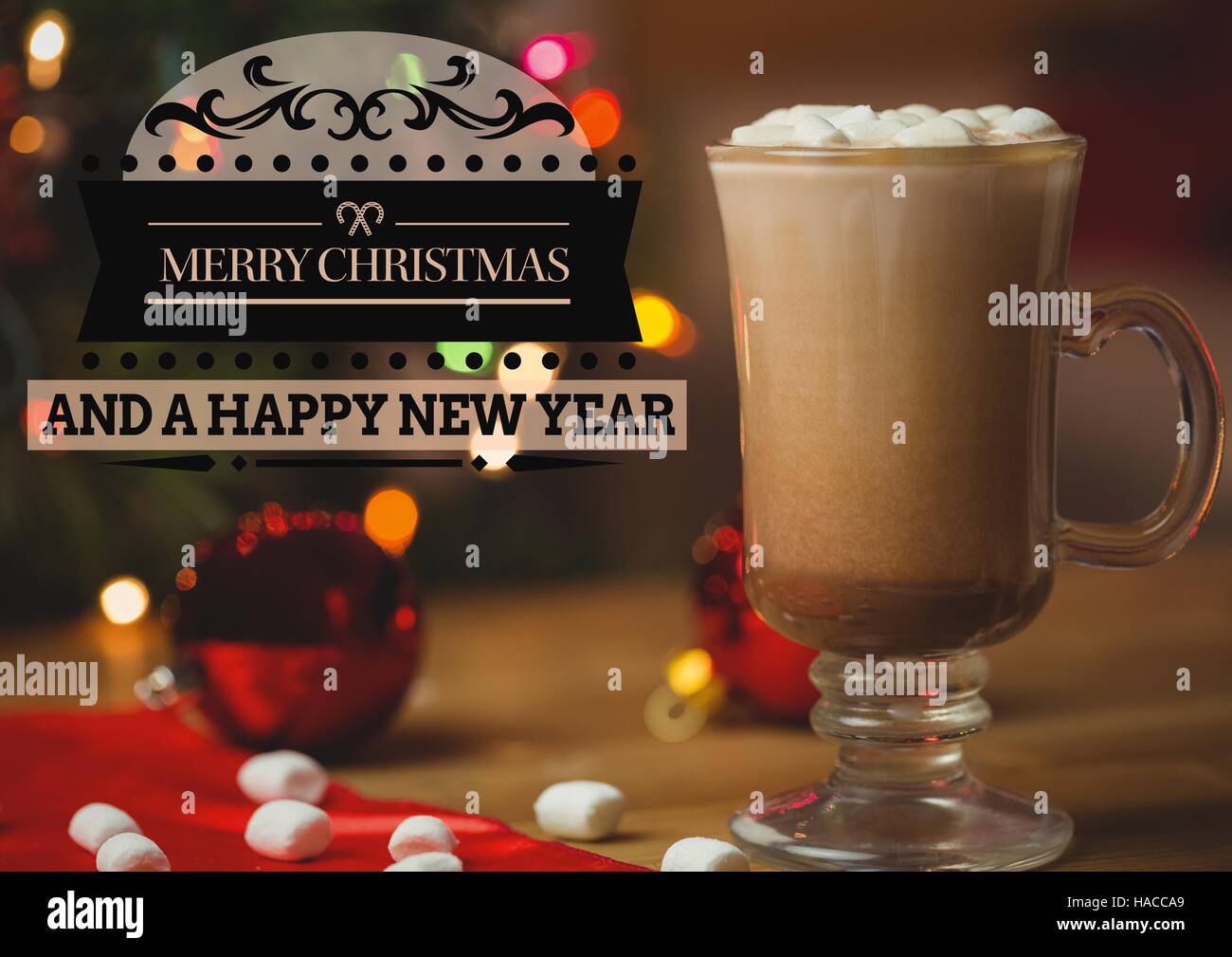 Merry Christmas greetings with coffee and marshmallow in glass Stock Photo