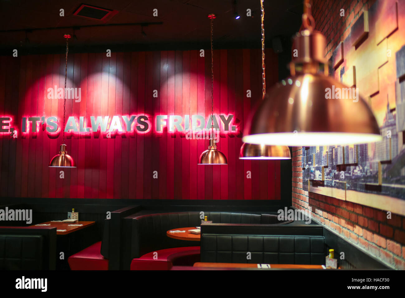 Interior of TGI Fridays restaurant and bar at Pavillion shopping mall, Kuala Lumpur, Malaysia. Stock Photo