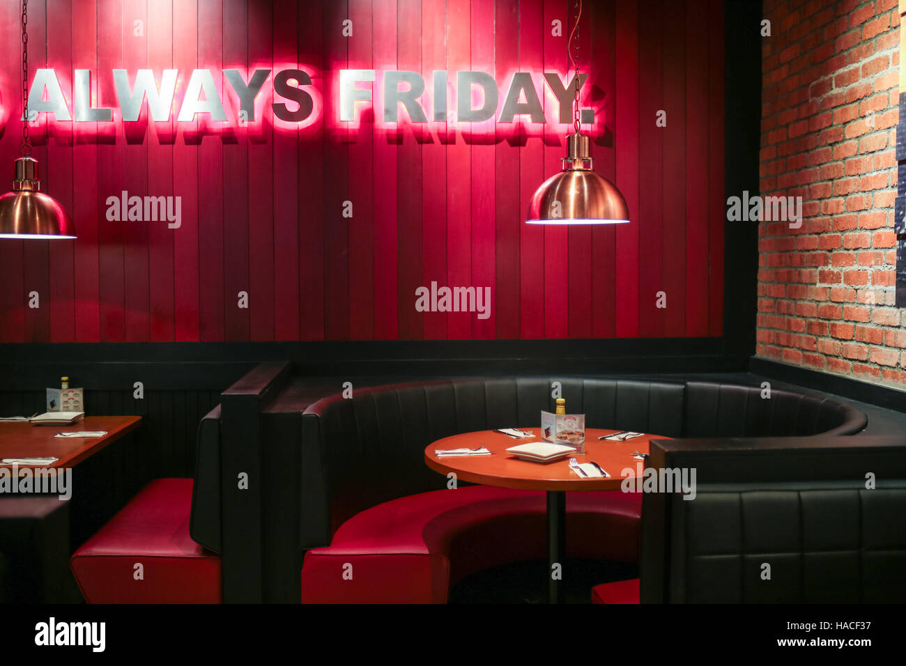 Interior of TGI Fridays restaurant and bar at Pavillion shopping mall, Kuala Lumpur, Malaysia. Stock Photo