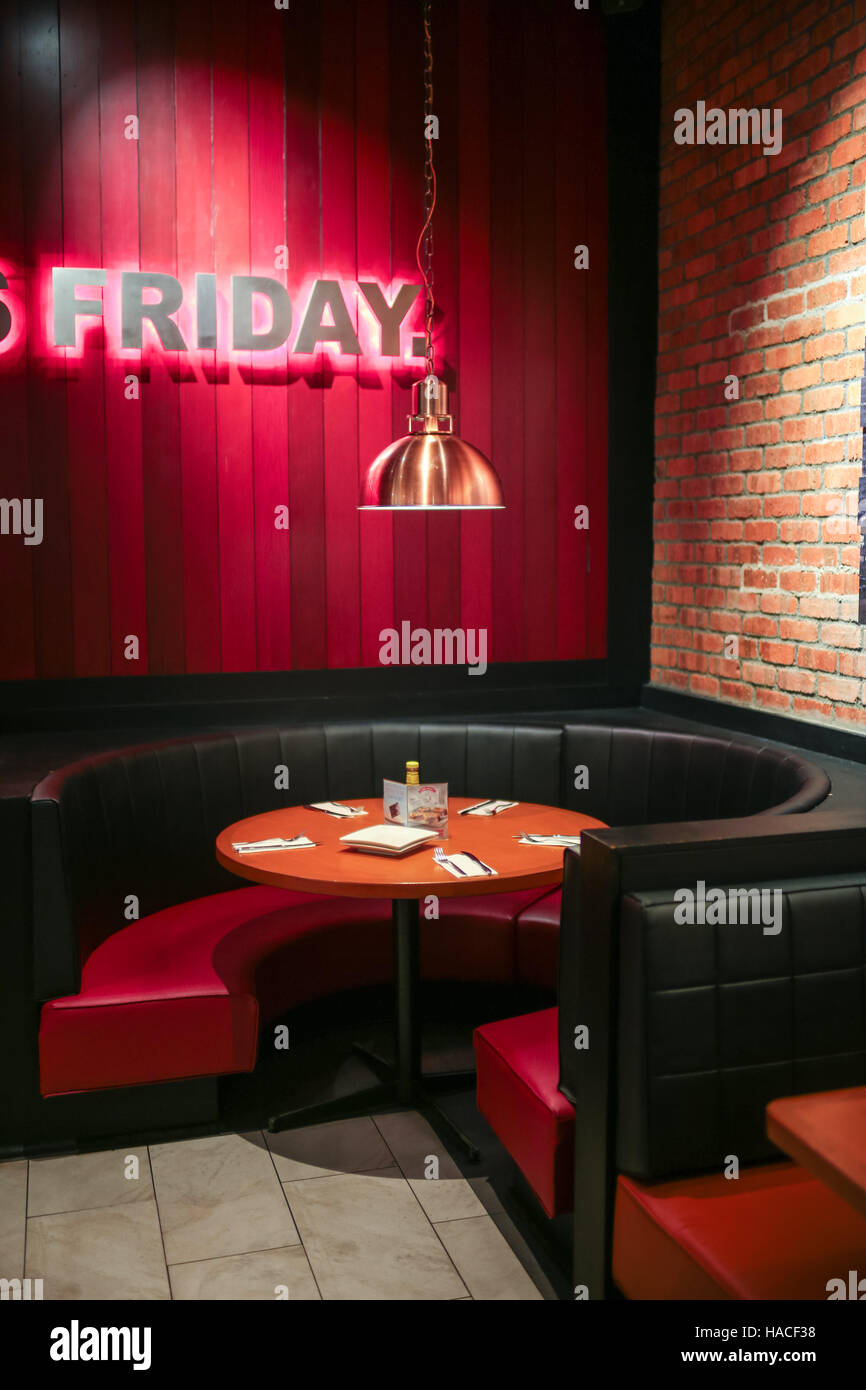 Interior of TGI Fridays restaurant and bar at Pavillion shopping mall, Kuala Lumpur, Malaysia. Stock Photo