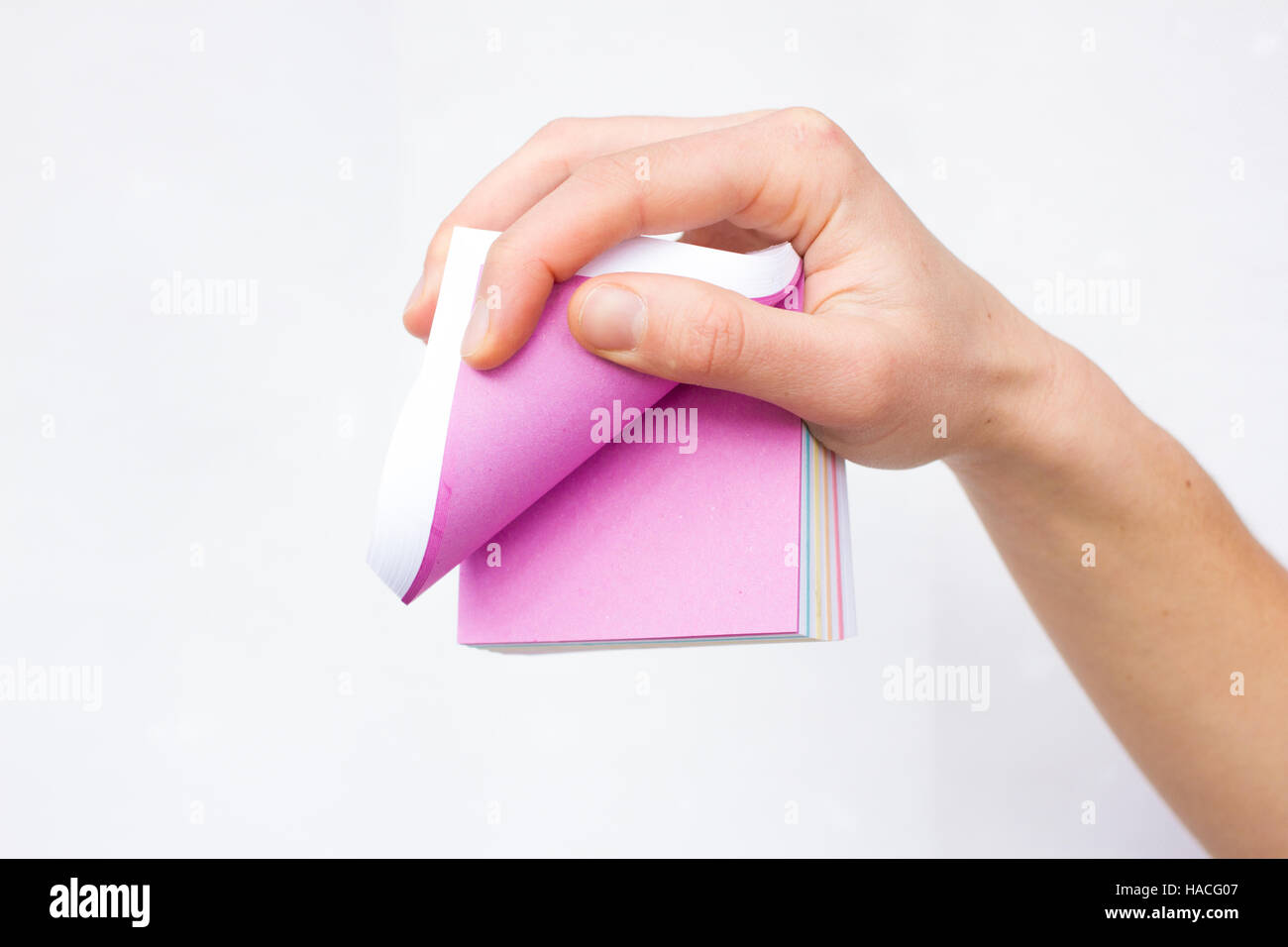 Pink sheet of paper in woman hands. Advertising. Finger hold Stock ...