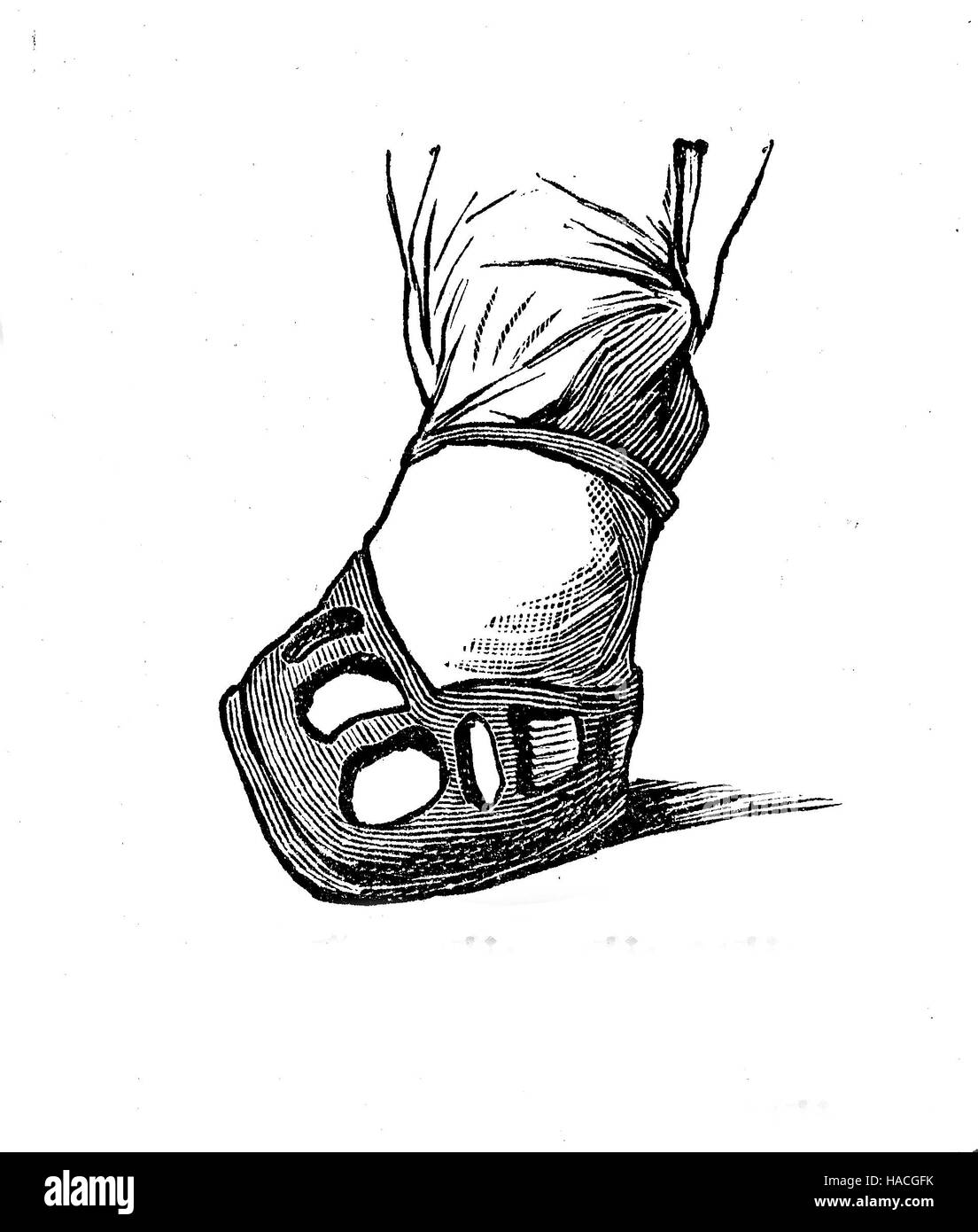 Shoes, fashion of the past. shoe from the Carolingian dynasty, 8. century, historic illustration, woodcut Stock Photo
