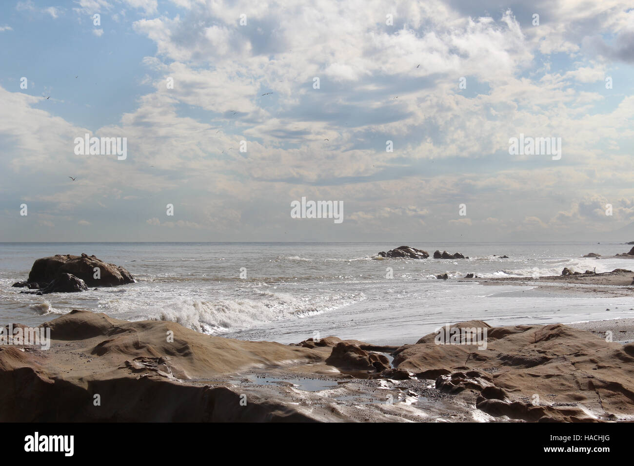 Cloudy sky reflecting on sea hi-res stock photography and images - Alamy