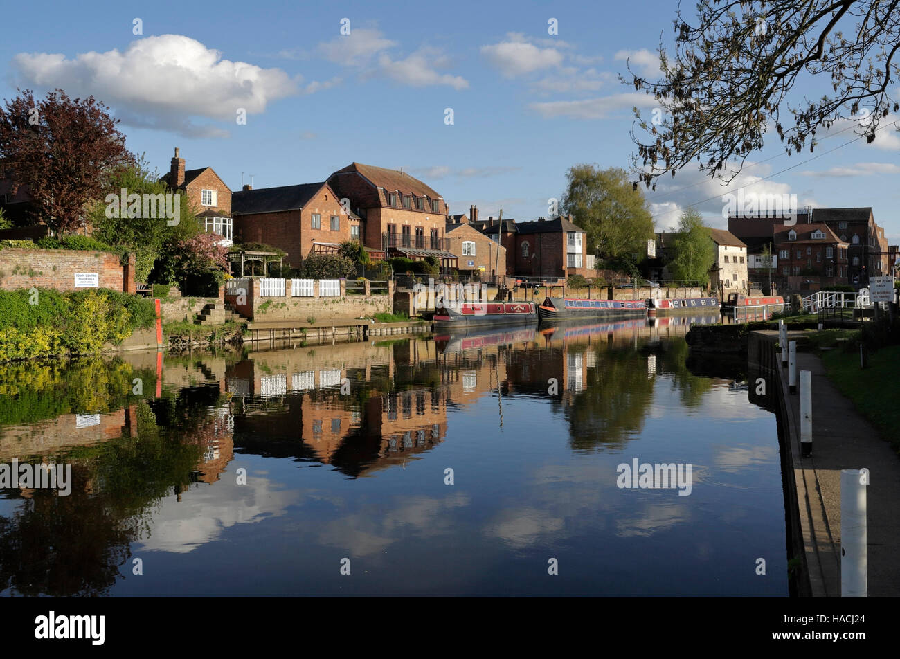 Narrow boats moored on the Scenic River Avon Tewkesbury Gloucestershire England UK, reflections in the water, navigation canal British waterway Stock Photo