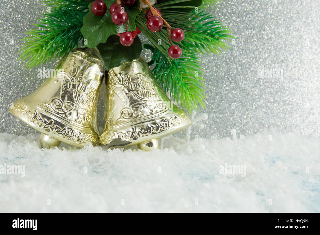 Two Christmas bells decoration on festive background Stock Photo