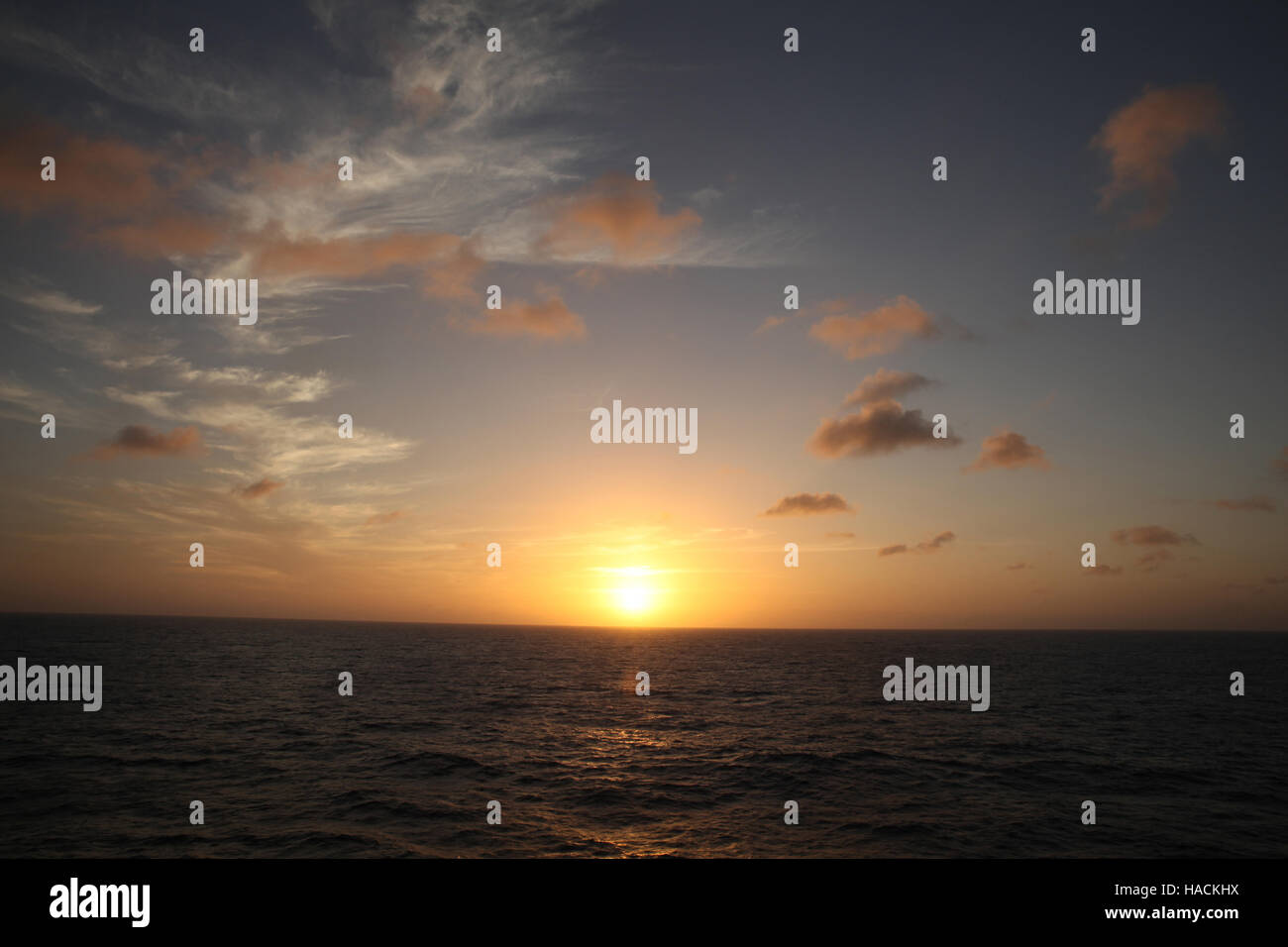 Sunset over the Ocean, off the coast of the Mexico, Caribbean. Stock Photo