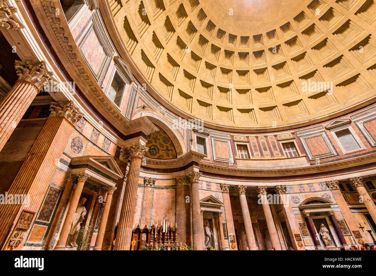 Rome, Italy. Roman Pantheon's dome and the opening at the top called the Oculus with sun streaming. Stock Photo