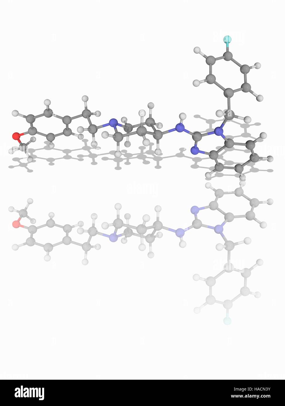 Astemizole. Molecular model of the second-generation antihistamine drug astemizole (C28.H31.F.N4.O). This has been withdrawn in most countries because of rare but potentially deadly side effects. Atoms are represented as spheres and are colour-coded: carbon (grey), hydrogen (white), nitrogen (blue), oxygen (red) and fluorine (cyan). Illustration. Stock Photo