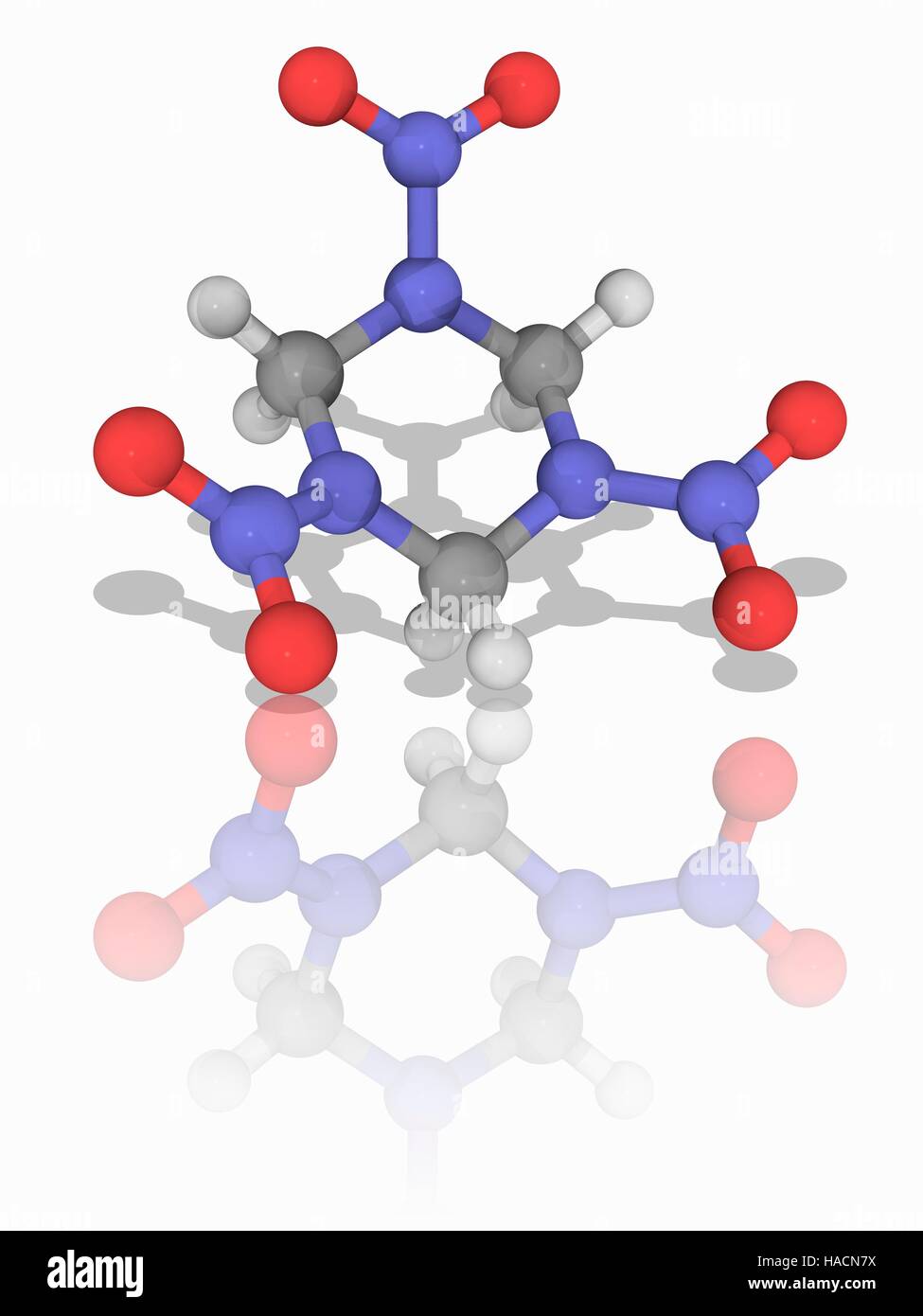 RDX explosive. Molecular model of the explosive RDX, also known as cyclonite (C3.H6.N6.O6). This explosive nitroamine has military and industrial applications, and was used extensively in World War II. Atoms are represented as spheres and are colour-coded: carbon (grey), hydrogen (white), nitrogen (blue) and oxygen (red). Illustration. Stock Photo