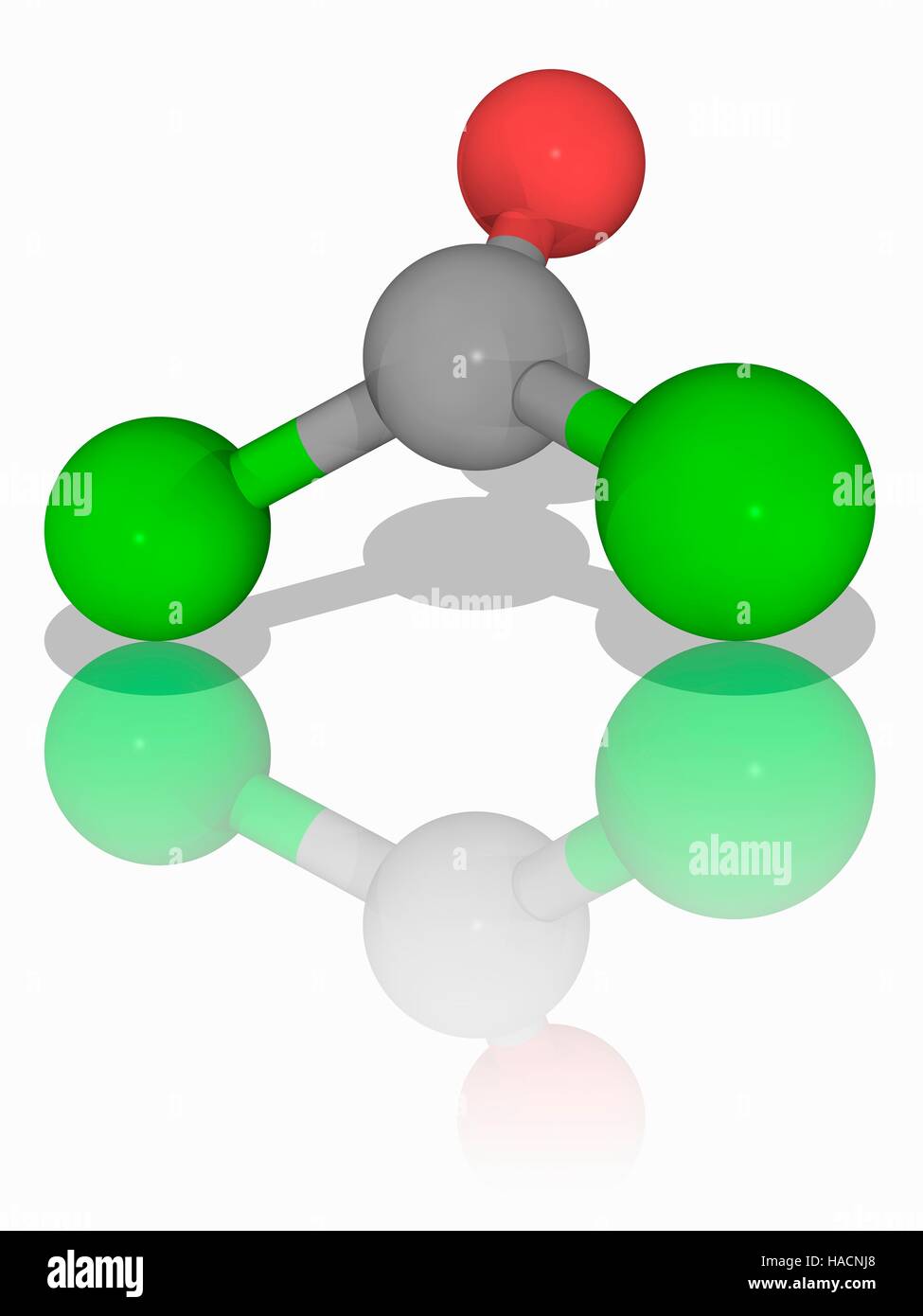Phosgene. Molecular model of the inorganic compound phosgene (C.O.Cl2). A colourless gas, it killed tens of thousands during its use as a chemical weapon in World War I. It is an acyl chloride, oxohalide, and non-metal halide. Atoms are represented as spheres and are colour-coded: carbon (grey), oxygen (red) and chlorine (green). Illustration. Stock Photo