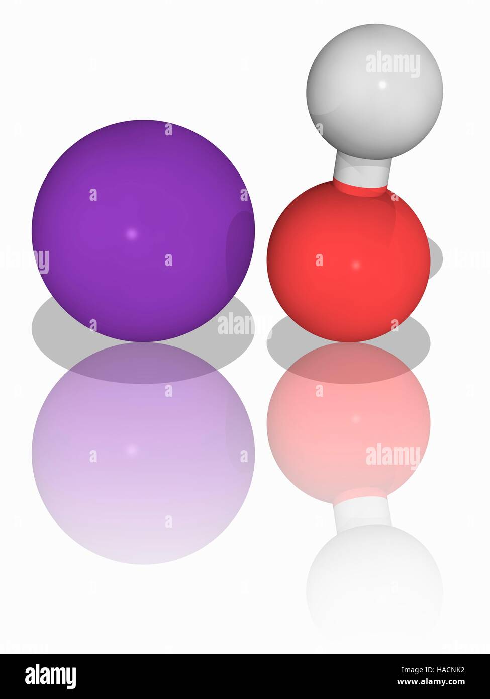 Potassium hydroxide. Molecular model of the inorganic compound potassium hydroxide (KOH), used as a precursor to most soft and liquid soaps as well as of numerous potassium-containing chemicals. Atoms are represented as spheres and are colour-coded: hydrogen (white), oxygen (red) and potassium (violet). Illustration. Stock Photo