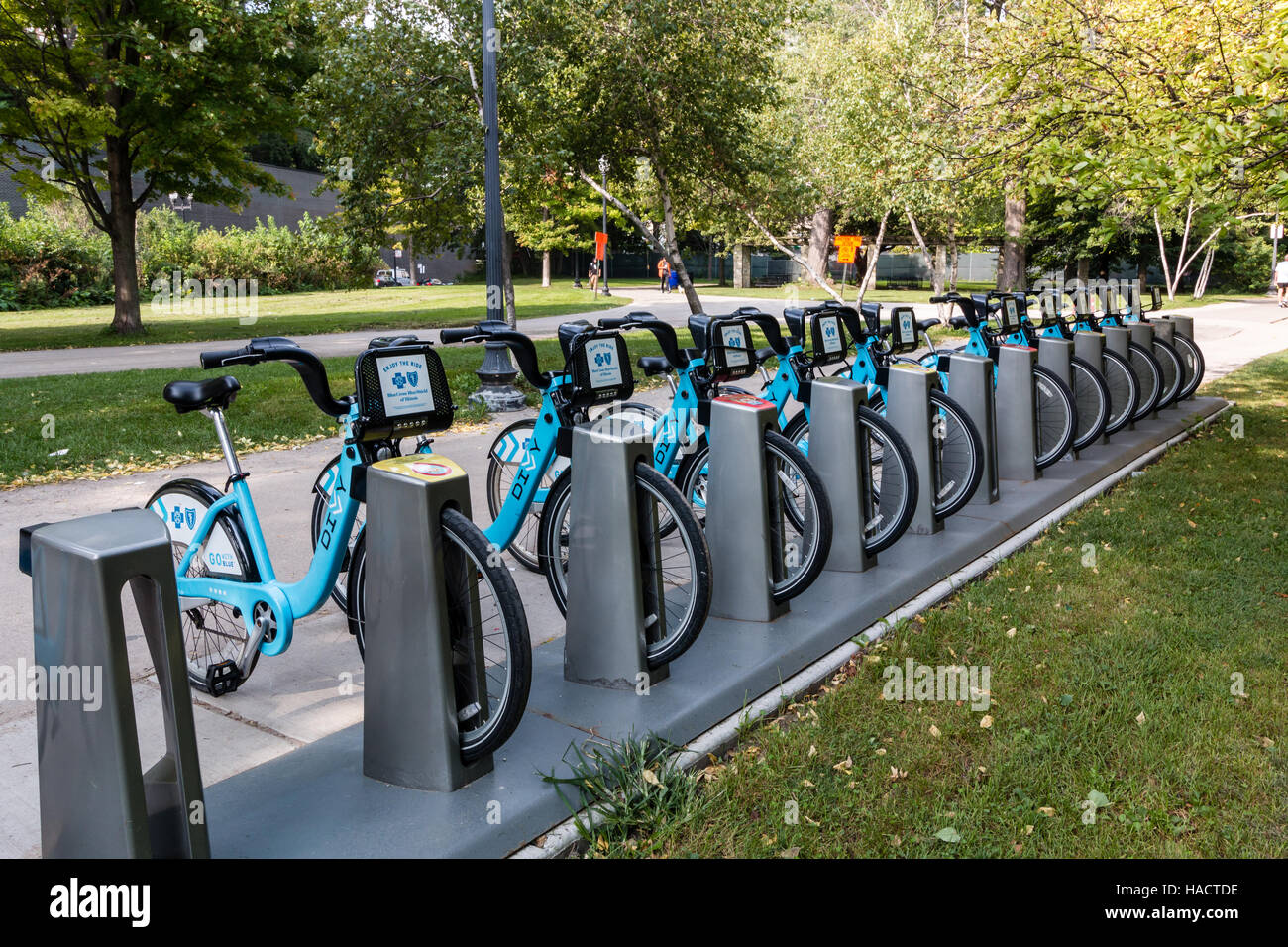 Cycles to rent offer an alternative and environmentally method of travel around the city.  Divvy rental bikes Stock Photo