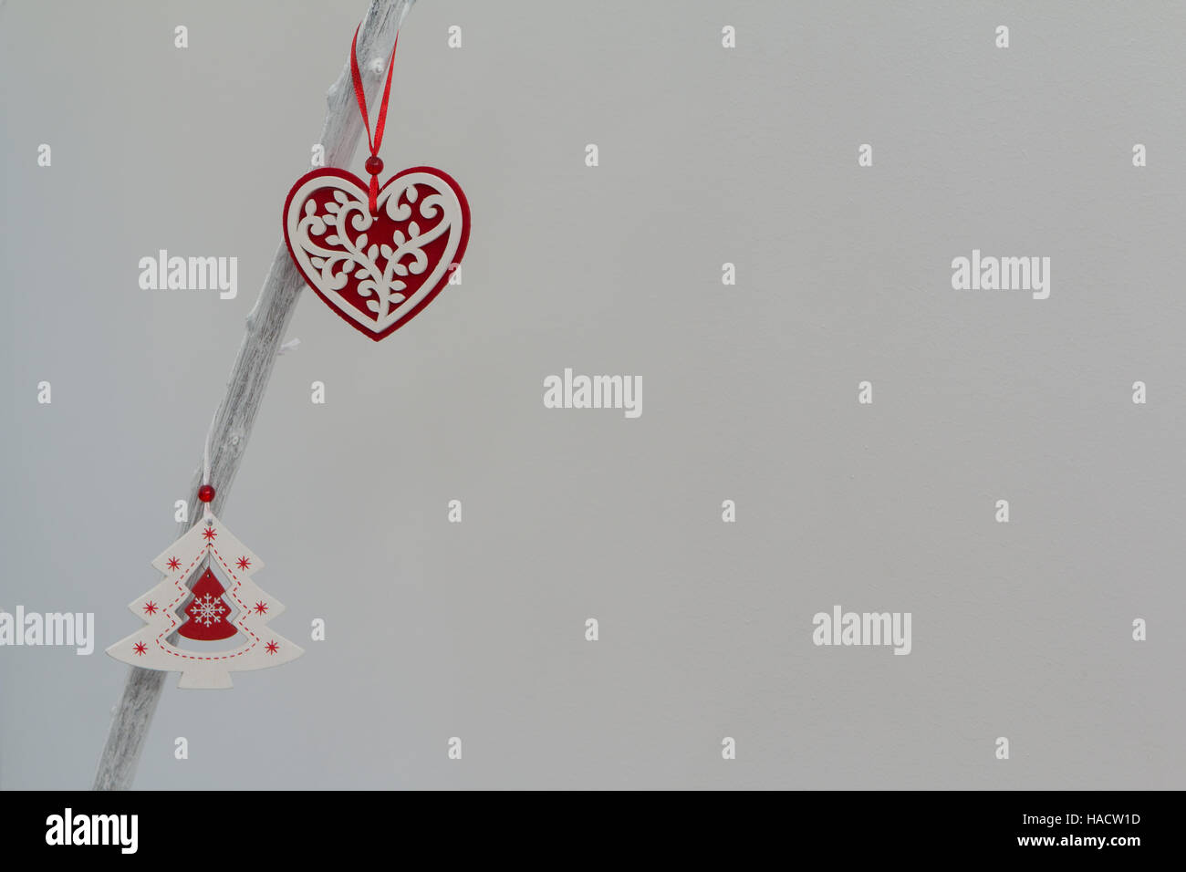 Beautiful ornates for Christmas hanging a white branch of a tree Stock