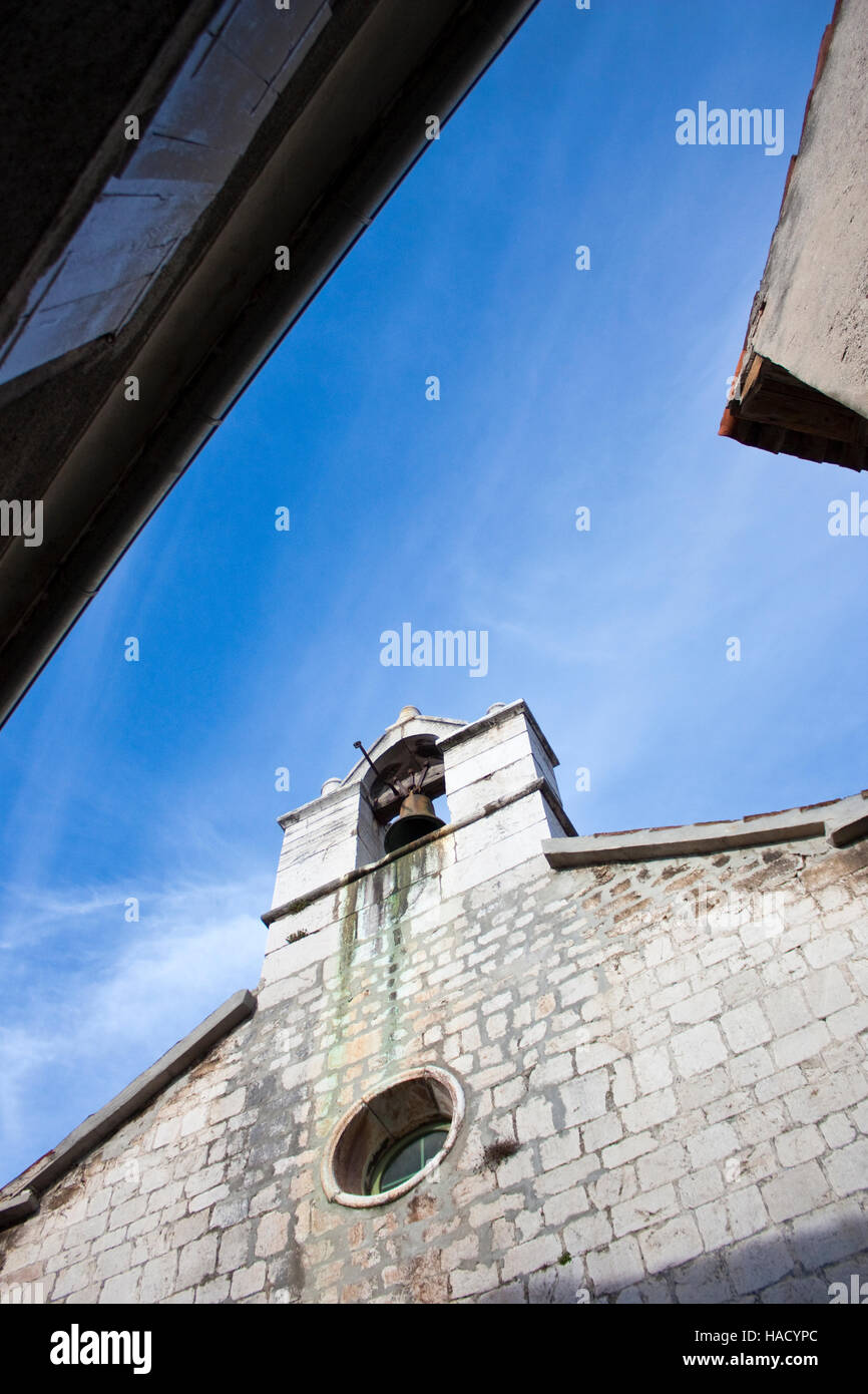 Old stone church with bell on island cres in croatia Stock Photo