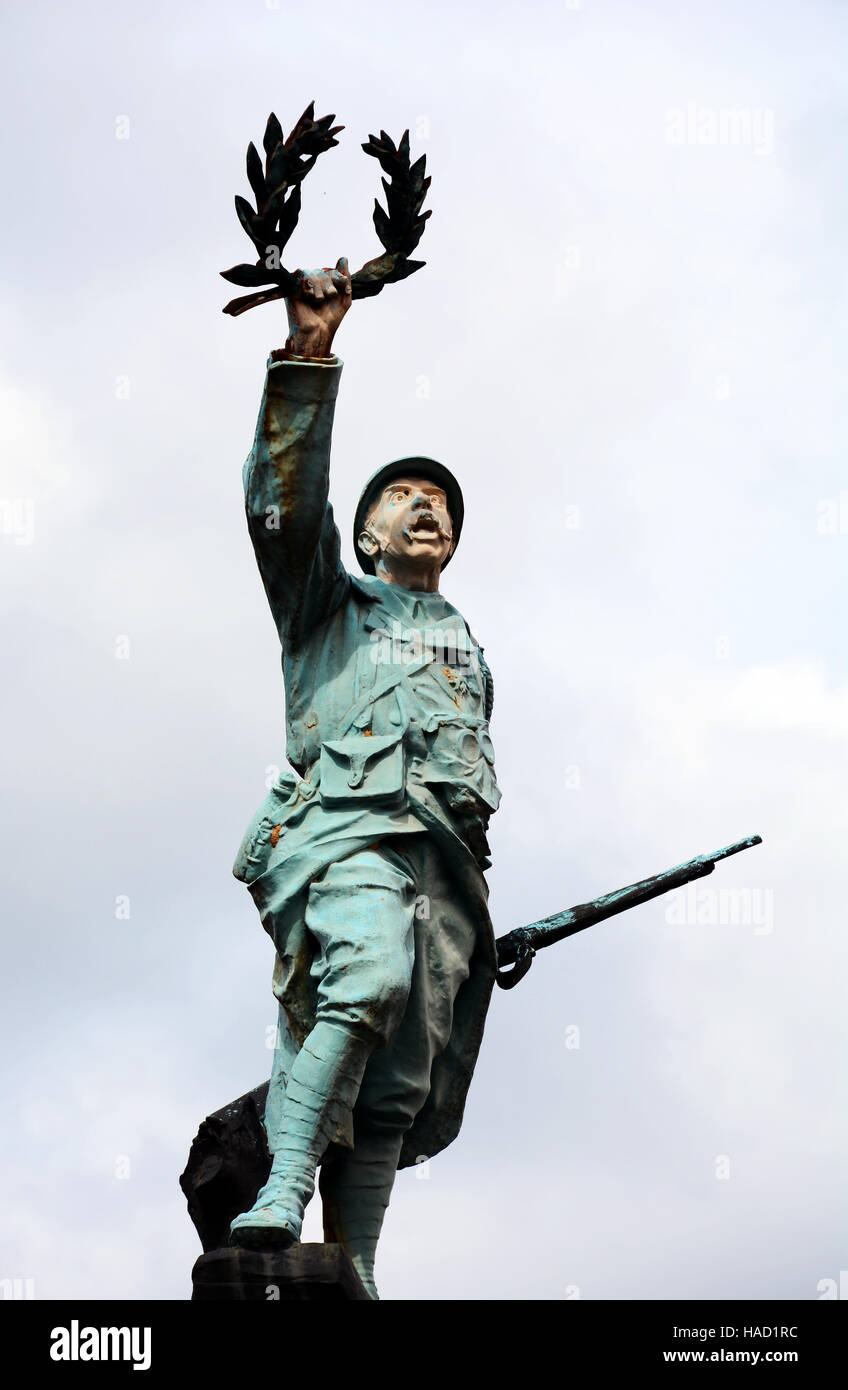 statue of french soldier of the 14-18 war waving a crown of laurels Stock Photo
