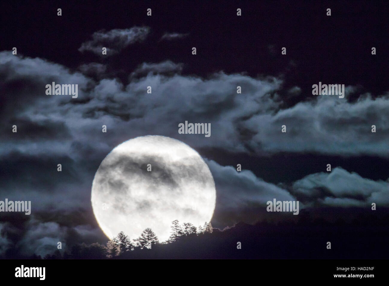 Full super moon rising over Rocky Mountains, Salida, Colorado, USA Stock Photo